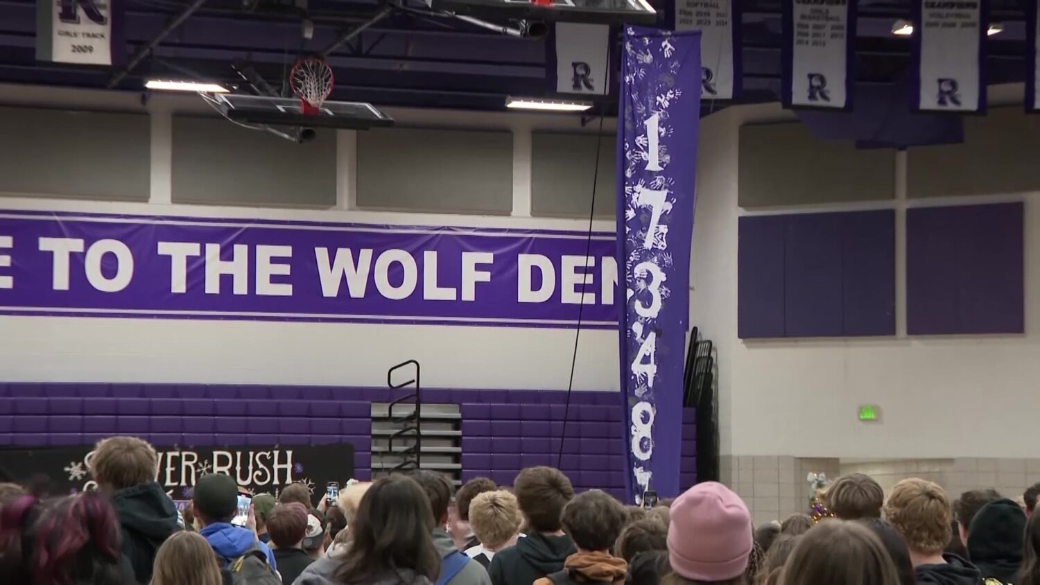 A banner in the Riverton High School gym displayed on Friday how much money students raised.