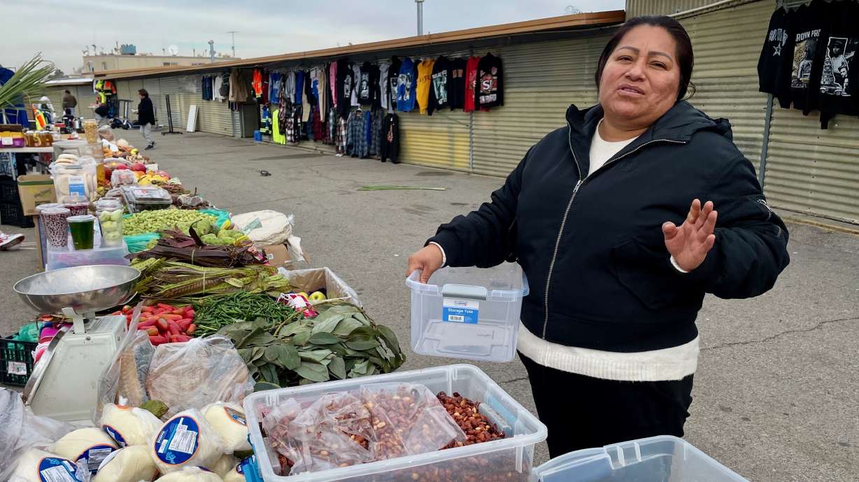 Lidia Agustin, a fruit and vegetable vendor at Redwood Swap Meet in West Valley City, on Saturday, a day before its planned closure.