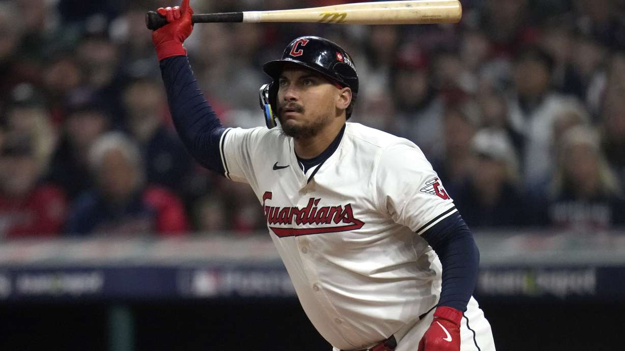 FILE - Cleveland Guardians' Josh Naylor watches his RBI single against the New York Yankees during the third inning in Game 4 of the baseball AL Championship Series, Oct. 18, 2024, in Cleveland.