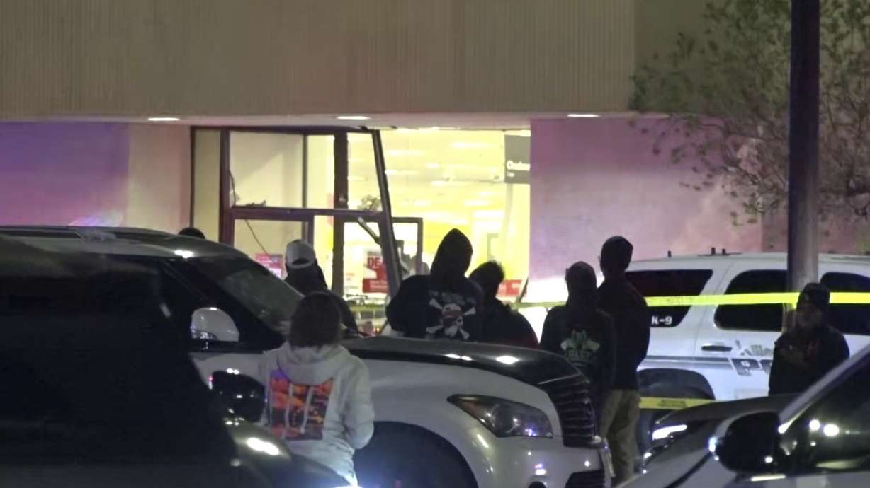This image provided by KXXV shows police responding to a JCPenney at a shopping mall as people look on Saturday, in Killeen, Texas.