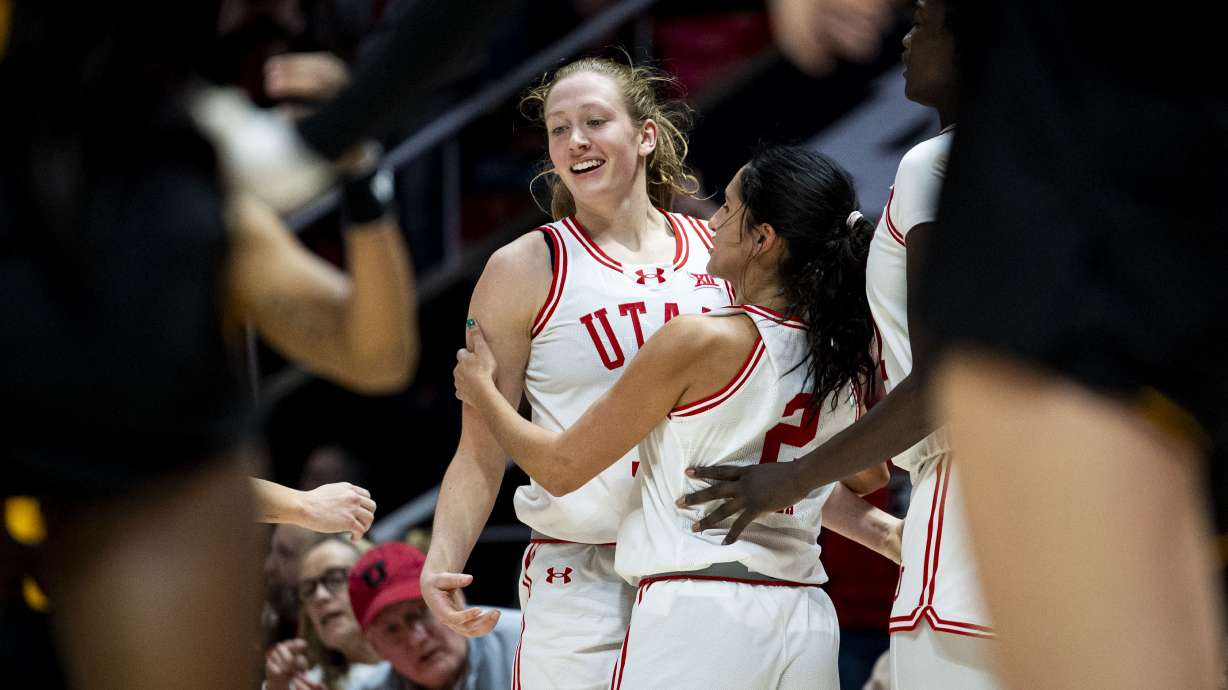 Utah Utes guard Ines Vieira (2) celebrates with guard Gianna Kneepkens (5) after Kneepkens earned an and-one opprotunity after being fouled on her made shot during an NCAA women’s basketball game between the University of Utah and Arizona State University held at the Jon M. Huntsman Center in Salt Lake City on Saturday, Dec. 21, 2024.