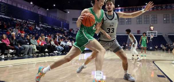 Welling's late block lifts Utah Valley over Weber State