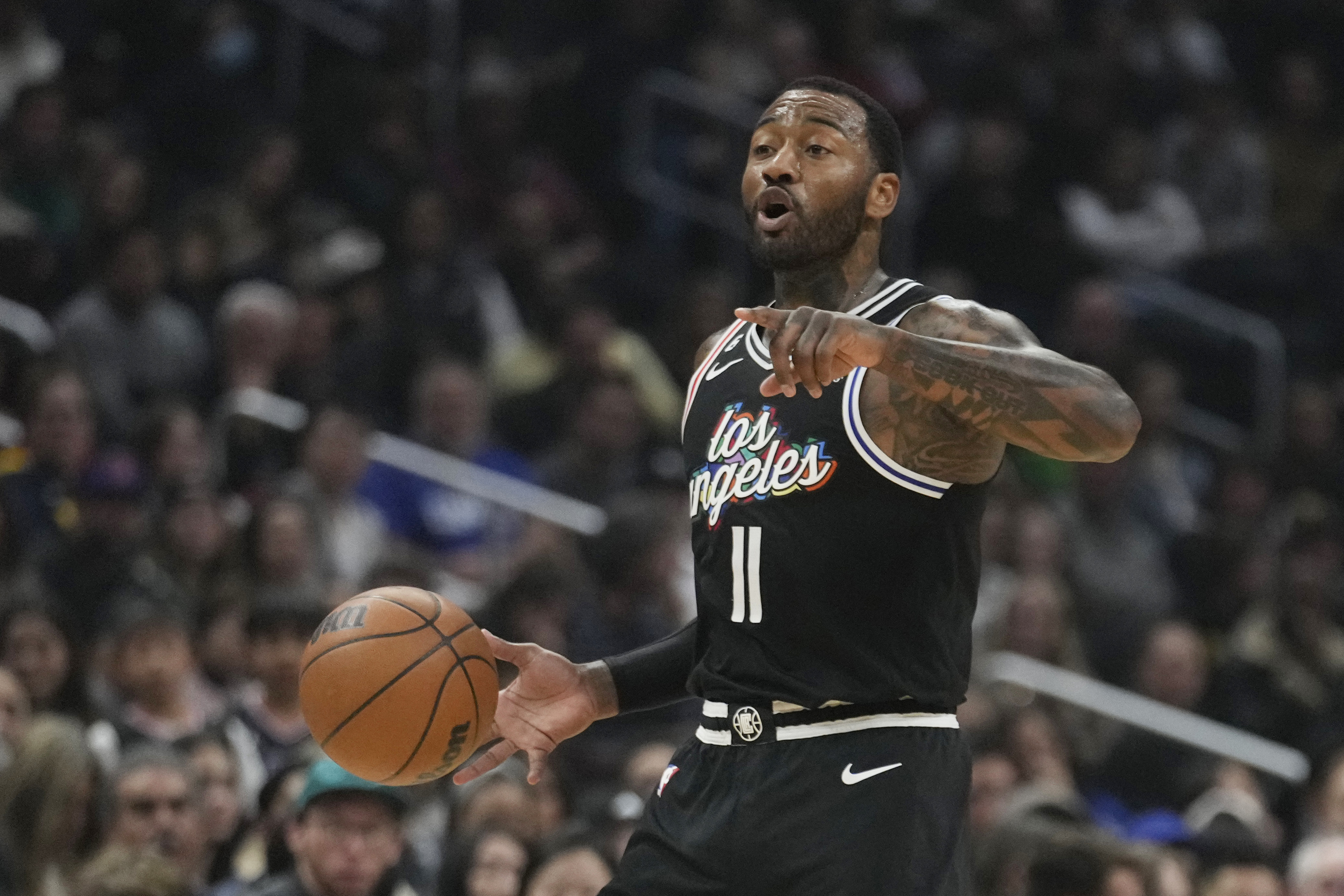 FILE - Los Angeles Clippers guard John Wall dribbles during an NBA basketball game against the Denver Nuggets Friday, Jan. 13, 2023, in Los Angeles.