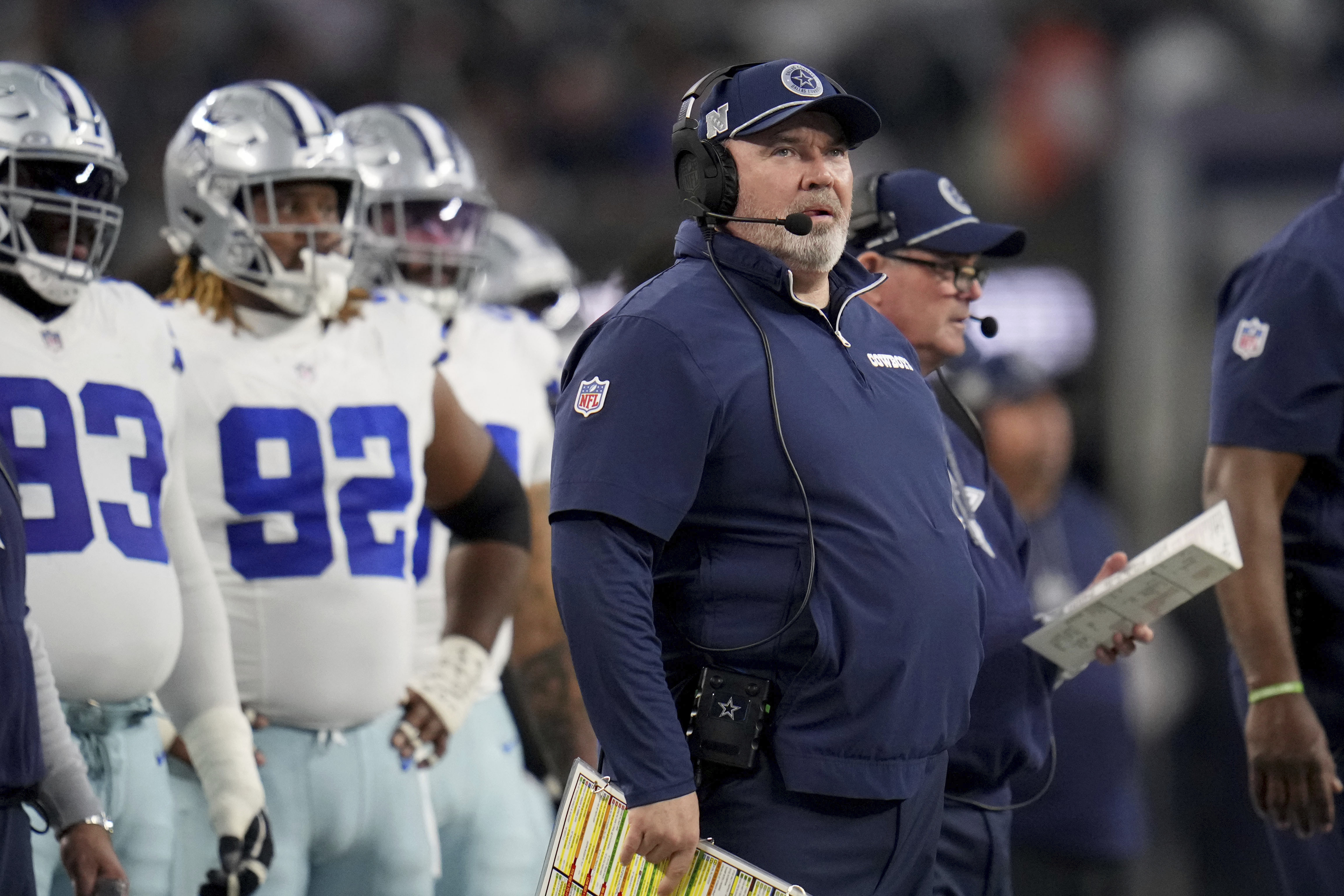 Dallas Cowboys head coach Mike McCarthy watches play against the Tampa Bay Buccaneers in the first half of an NFL football game in Arlington, Texas, Sunday, Dec. 22, 2024. 