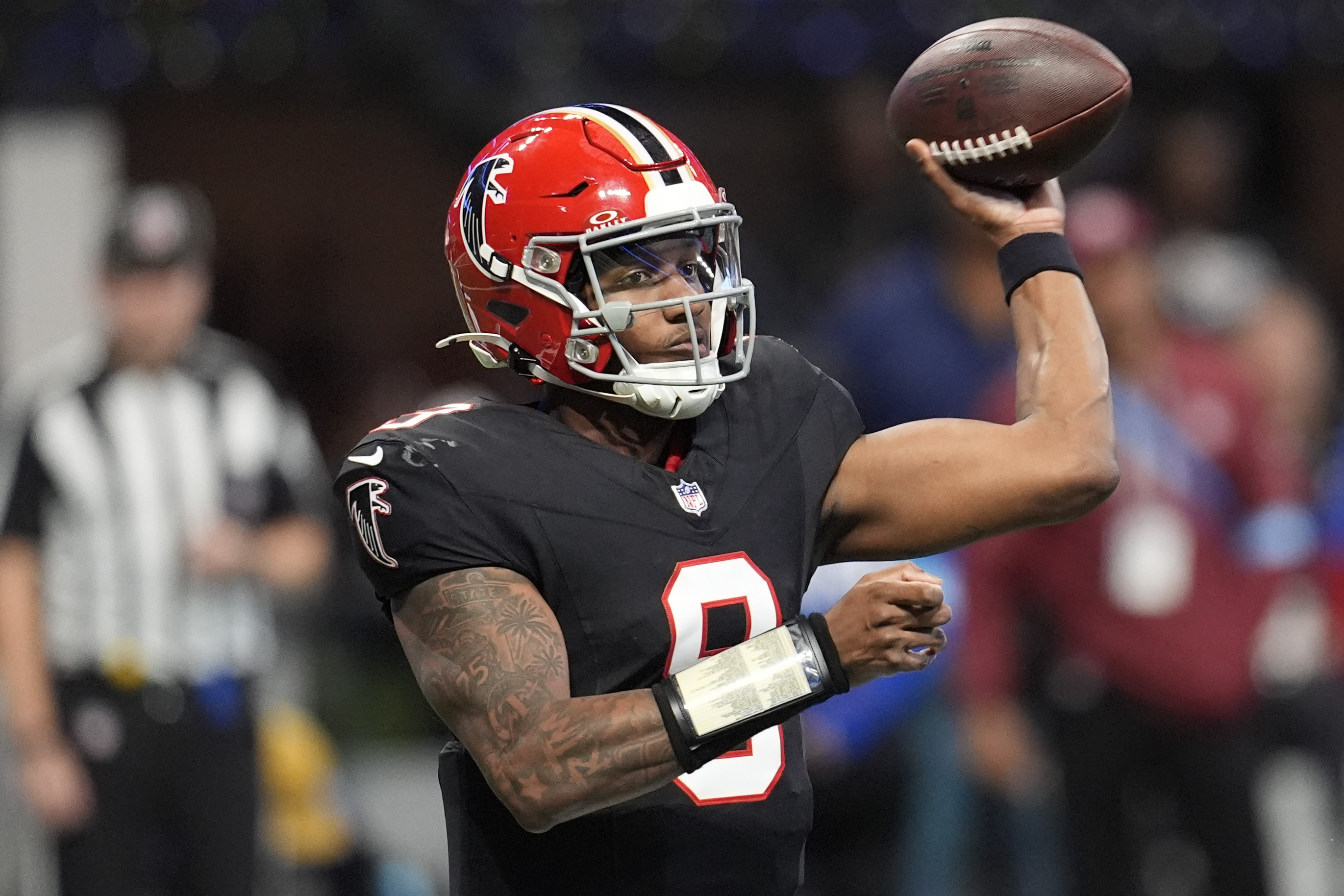 Atlanta Falcons quarterback Michael Penix Jr. (9) throws the ball in the second half of an NFL football game against the New York Giants in Atlanta, Sunday, Dec. 22, 2024.