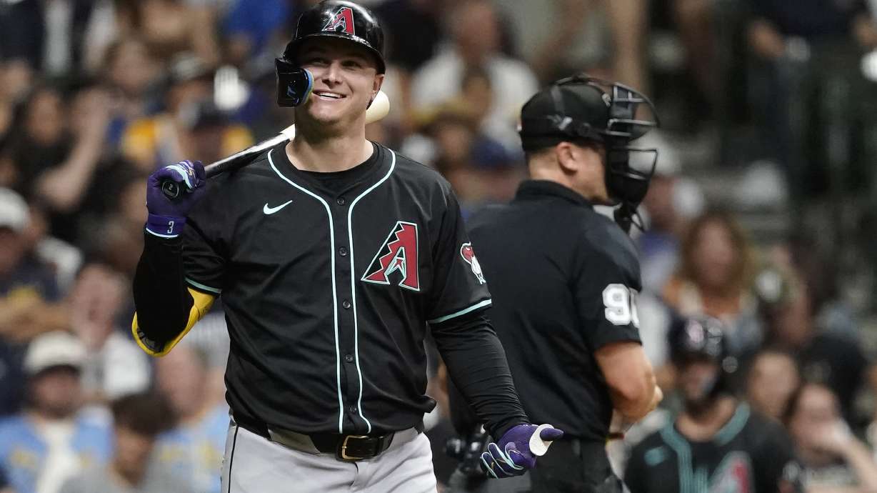 FILE - Arizona Diamondbacks' Joc Pederson smiles while at bat during the third inning of a baseball game against the Milwaukee Brewers, Sept. 21, 2024, in Milwaukee.