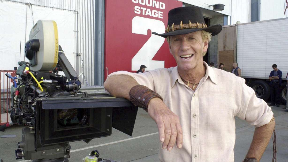 Actor Paul Hogan stands on the set of "Crocodile Dundee in Los Angeles" on the Gold Coast, Australia, on Aug. 29, 2000. The huge crocodile that rose to fame with a cameo in the movie "Crocodile Dundee" has died.