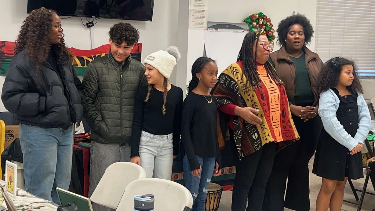 Project Success Coalition is hosting a Kwanzaa event in Ogden on Sunday, Dec. 29. The photo shows participants in a 2023 Kwanzaa event hosted by the group including Betty Sawyer, third from right, the event organizer.