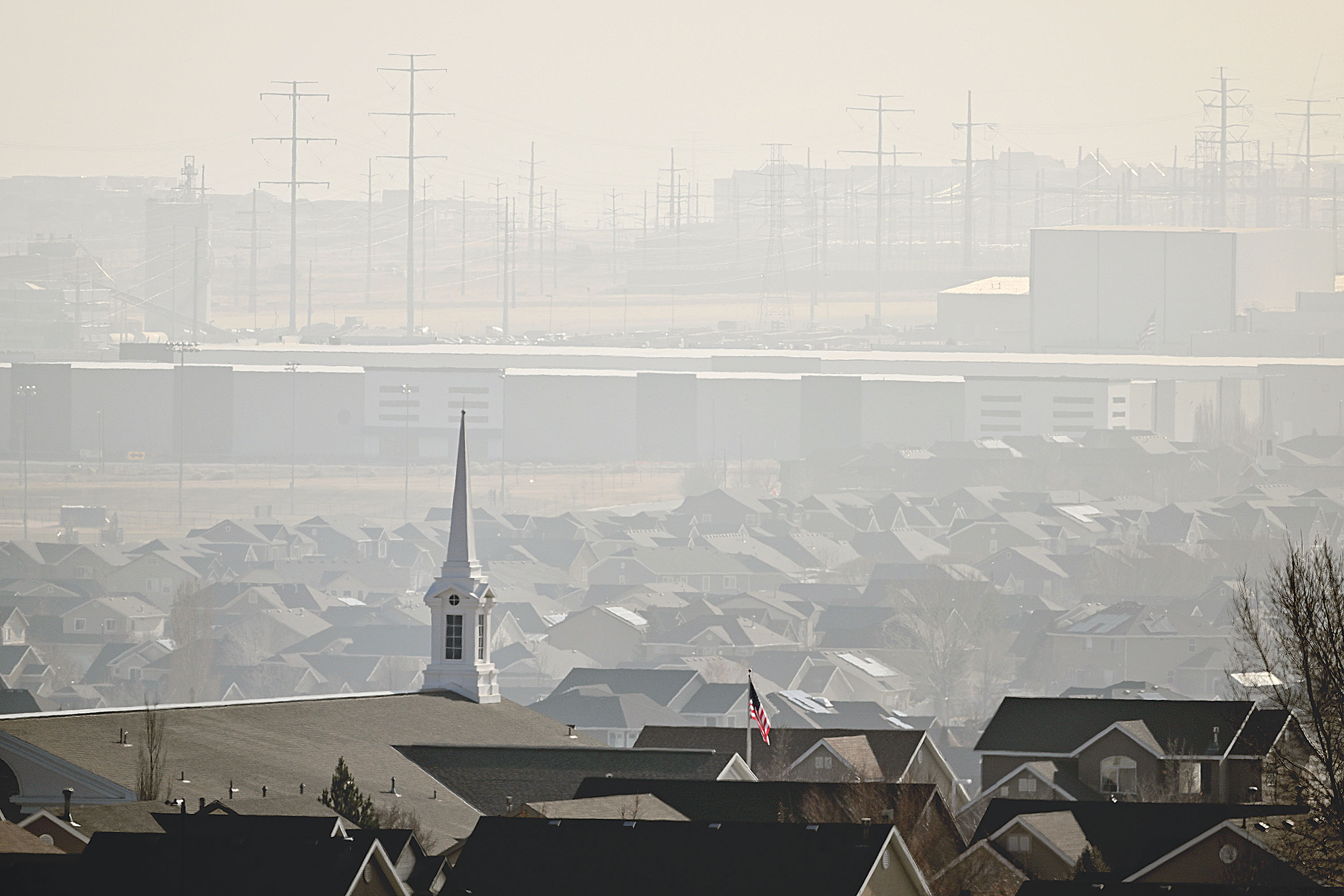 Dirty air in and around Salt Lake City on Monday. A storm that passed through the area earlier in the day wasn't strong enough to clear out pollution built up underneath the inversion.