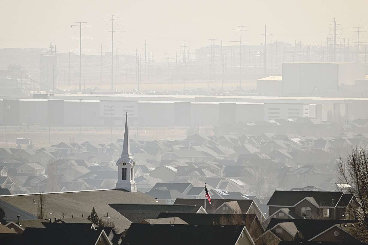 Dirty air in and around Salt Lake City on Monday. A storm that passed through the area earlier in the day wasn't strong enough to clear out pollution built up underneath the inversion.