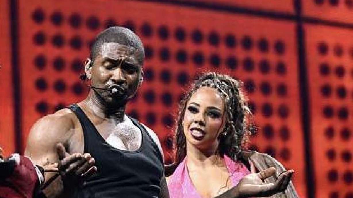 Imani Peterson, right, a 2021 graduate of Corner Canyon High School, dances with R&B star Usher while on tour. Peterson is a dancer on Usher's World Tour.