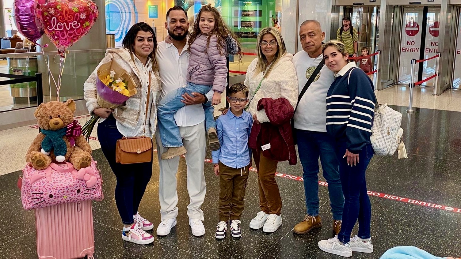 Yenny Rodríguez de Saavedra, third from right, with her husband Wilfredo Saavedra and other family members at the Salt Lake City International Airport on Dec. 3. The Venezuelan woman died Saturday, Dec. 21, in a car crash.