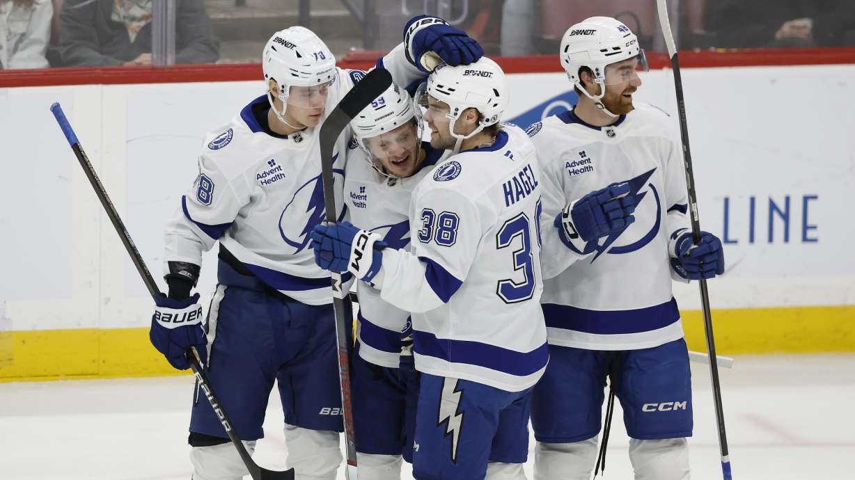 Tampa Bay Lightning right wing Nikita Kucherov (86) and teammates celebrate against the Florida Panthers during the first period of an NHL hockey game Monday, Dec. 23, 2024, in Sunrise, Fla.