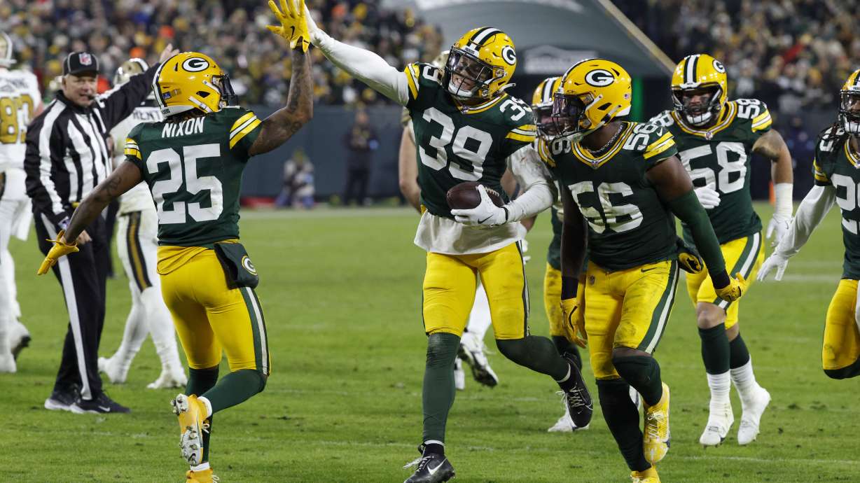 Green Bay Packers safety Zayne Anderson (39) celebrates his interception during the second half of an NFL football game against the New Orleans Saints, Monday, Dec. 23, 2024, in Green Bay, Wis.