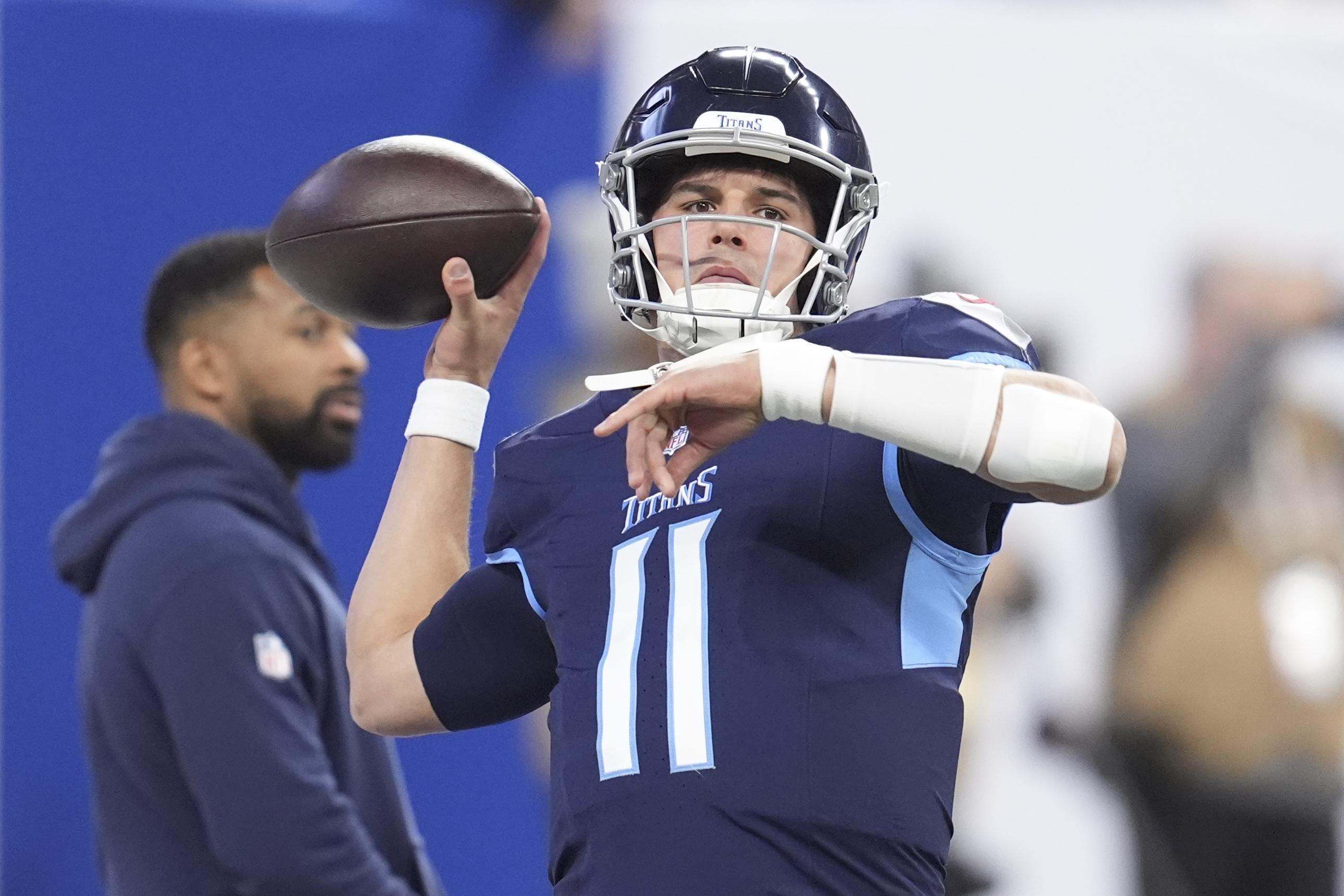 Tennessee Titans quarterback Mason Rudolph (11) warms up before an NFL football game against the Indianapolis Colts, Sunday, Dec. 22, 2024, in Indianapolis. 