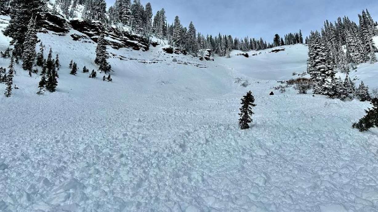 Two brothers made it out of the backcountry safely after experiencing a close call with a large avalanche Tuesday.