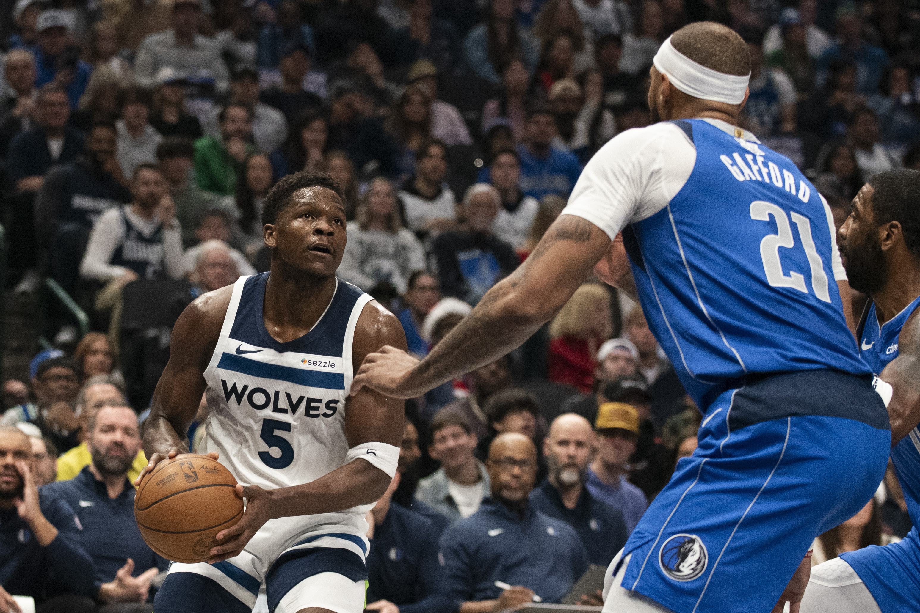 Edwards scores 26, Wolves hold on to beat Mavs 105-99 after Doncic injury