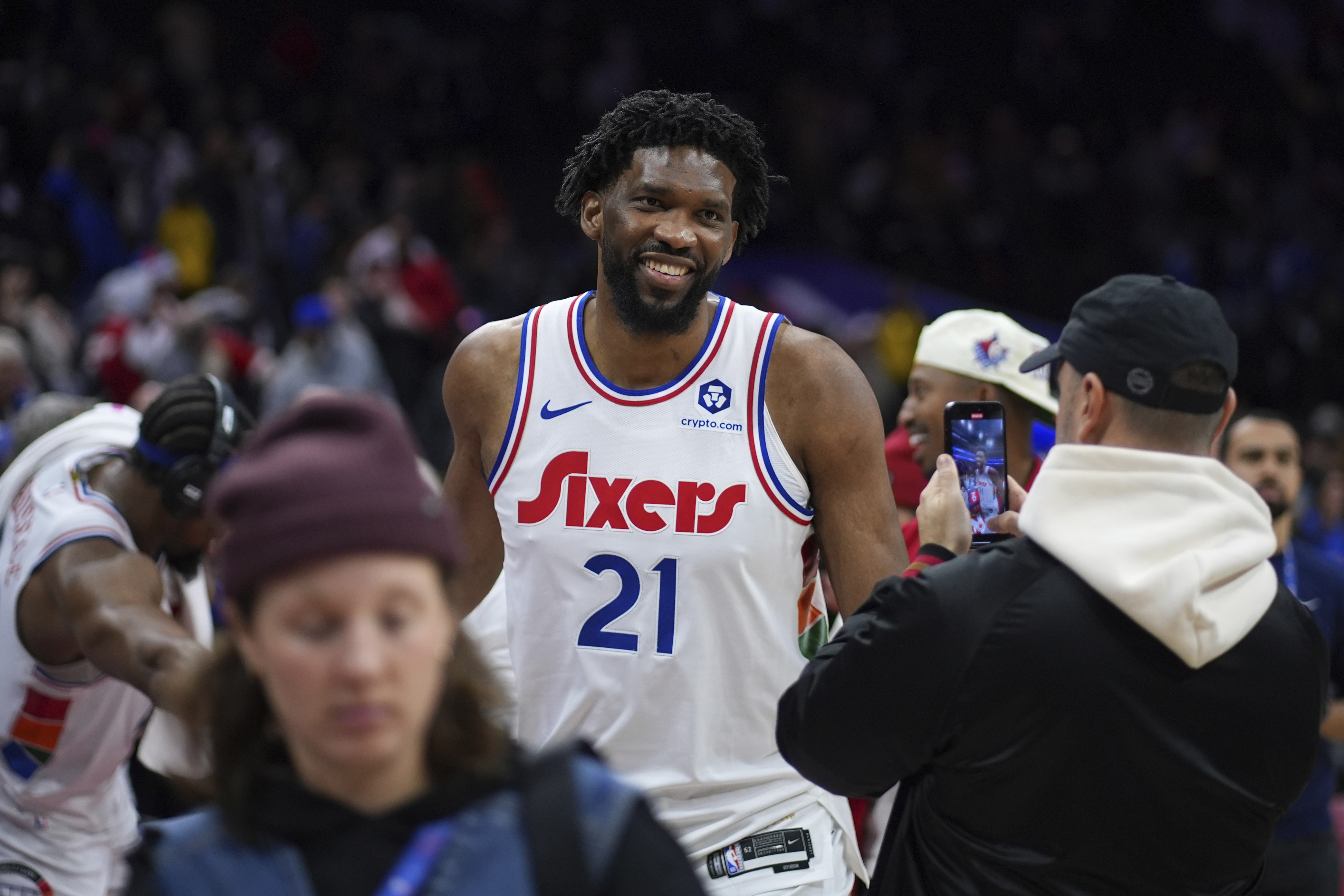 Philadelphia 76ers' Joel Embiid smiles after the 76ers won an NBA basketball game against the San Antonio Spurs, Monday, Dec. 23, 2024, in Philadelphia.