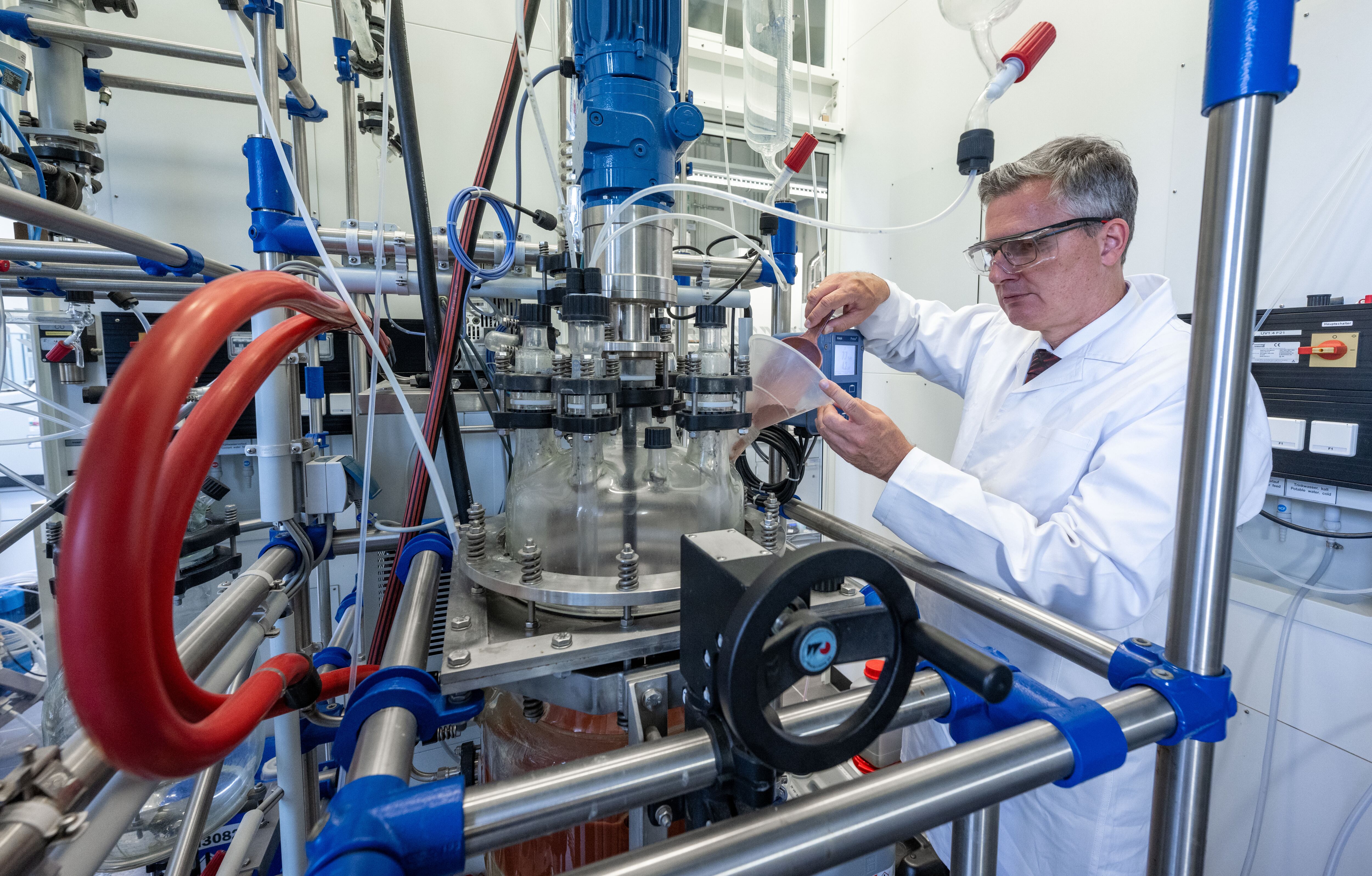 In a laboratory at TU Bergakademie in Saxony, Freiberg, professor Martin Bertau works on a red mud reactor. According to Freiberg scientists, gallium is contained in red mud, the production waste from aluminum manufacturing.