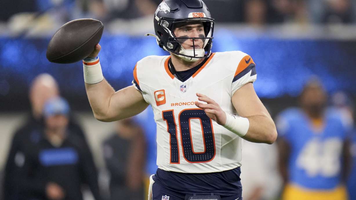 Denver Broncos quarterback Bo Nix (10) throws a pass during the first half an NFL football game against the Los Angeles Chargers, Thursday, Dec. 19, 2024, in Inglewood, Calif.
