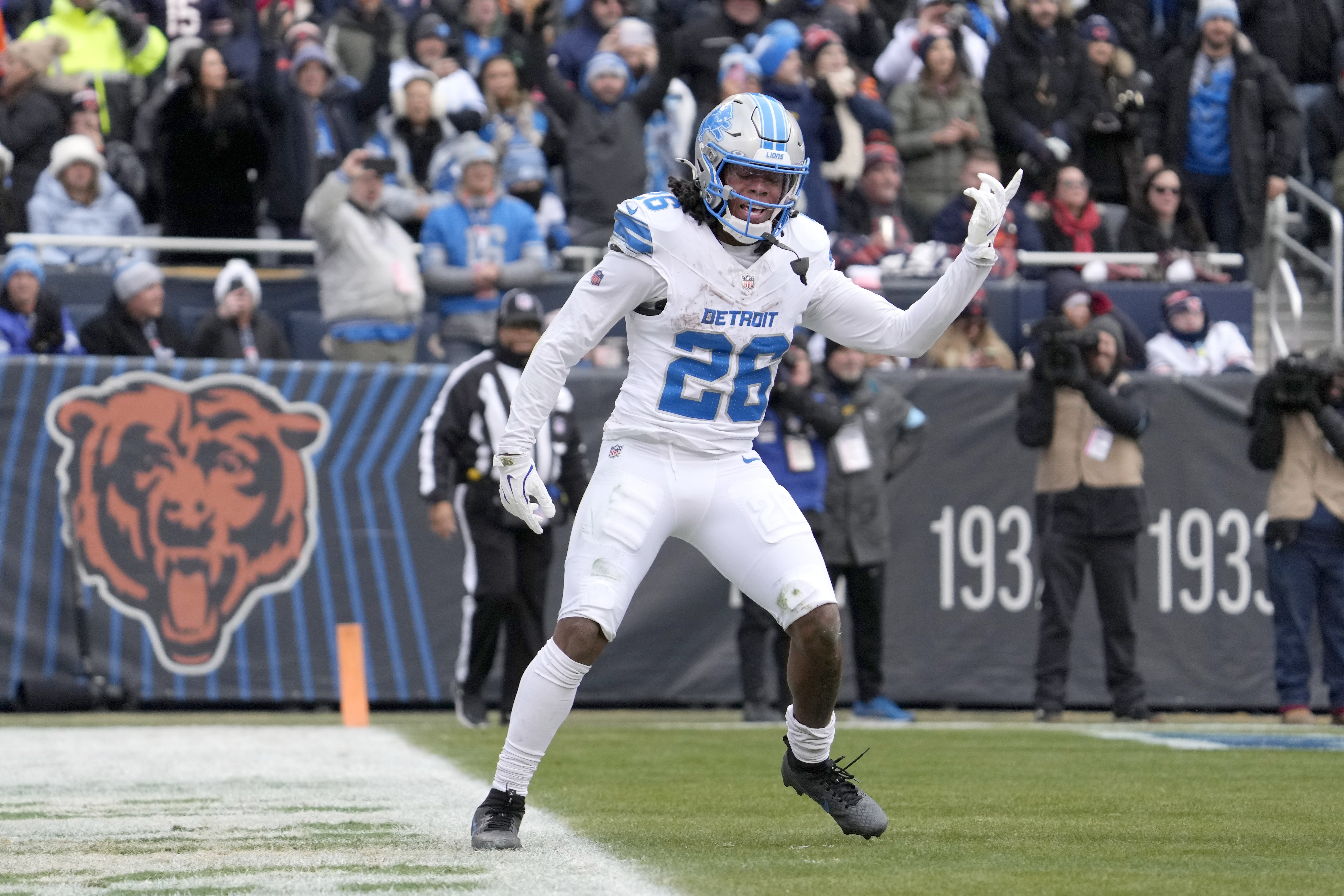 Detroit Lions running back Jahmyr Gibbs celebrates his touchdown during the first half of an NFL football game against the Chicago Bears on Sunday, Dec. 22, 2024, in Chicago.