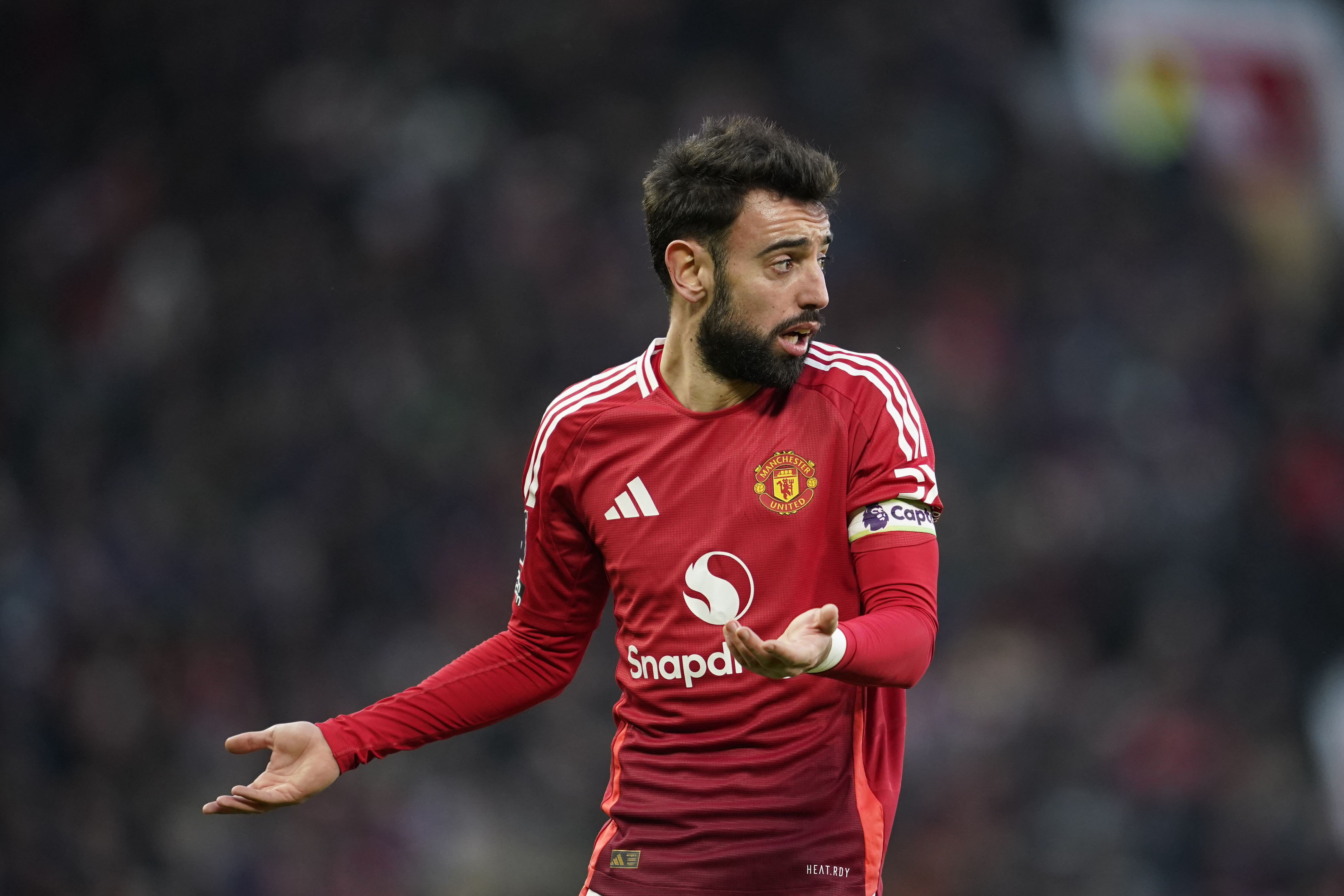 Manchester United's Bruno Fernandes gestures in frustration during the English Premier League soccer match between Manchester United and Bournemouth at the Old Trafford stadium in Manchester, England, Sunday, Dec. 22, 2024.