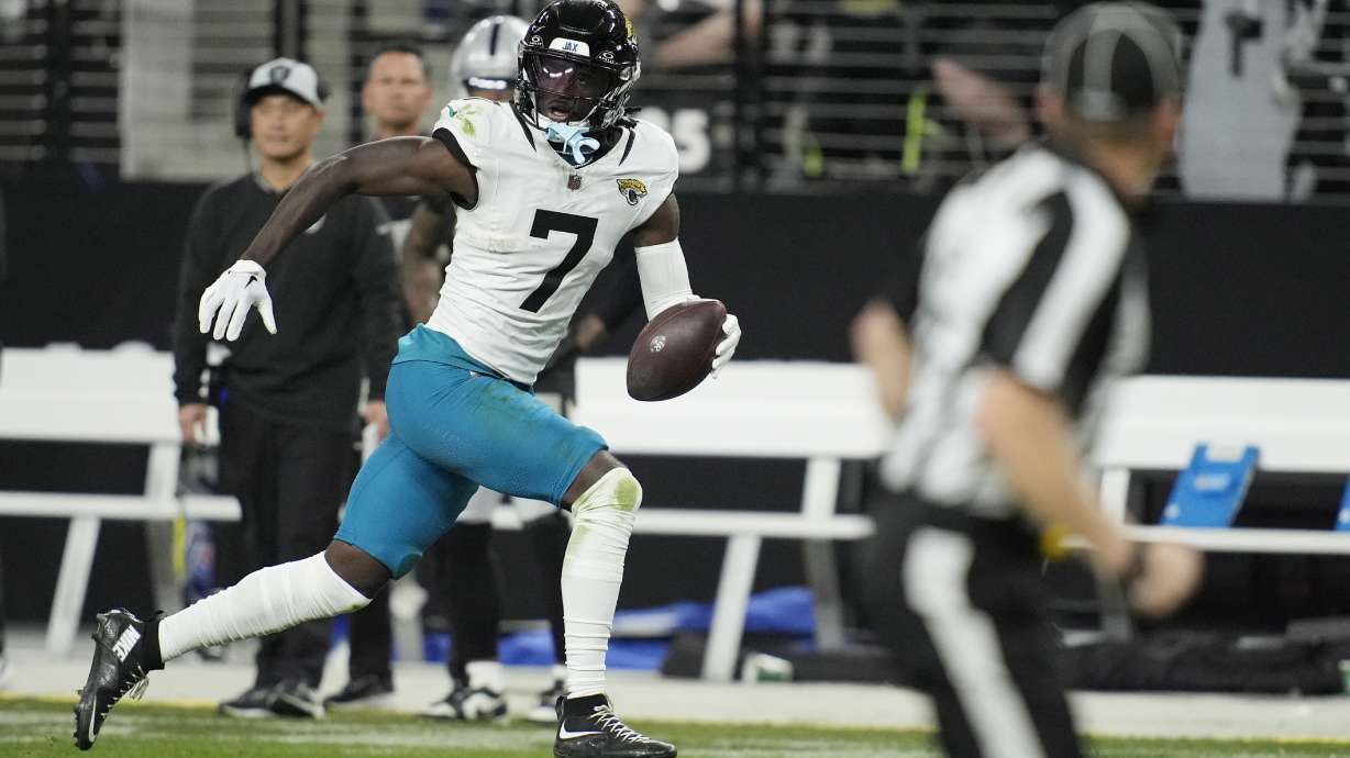Jacksonville Jaguars wide receiver Brian Thomas Jr. runs to the end zone for a touchdown after making a catch against the Las Vegas Raiders during the second half of an NFL football game Sunday, Dec. 22, 2024, in Las Vegas.