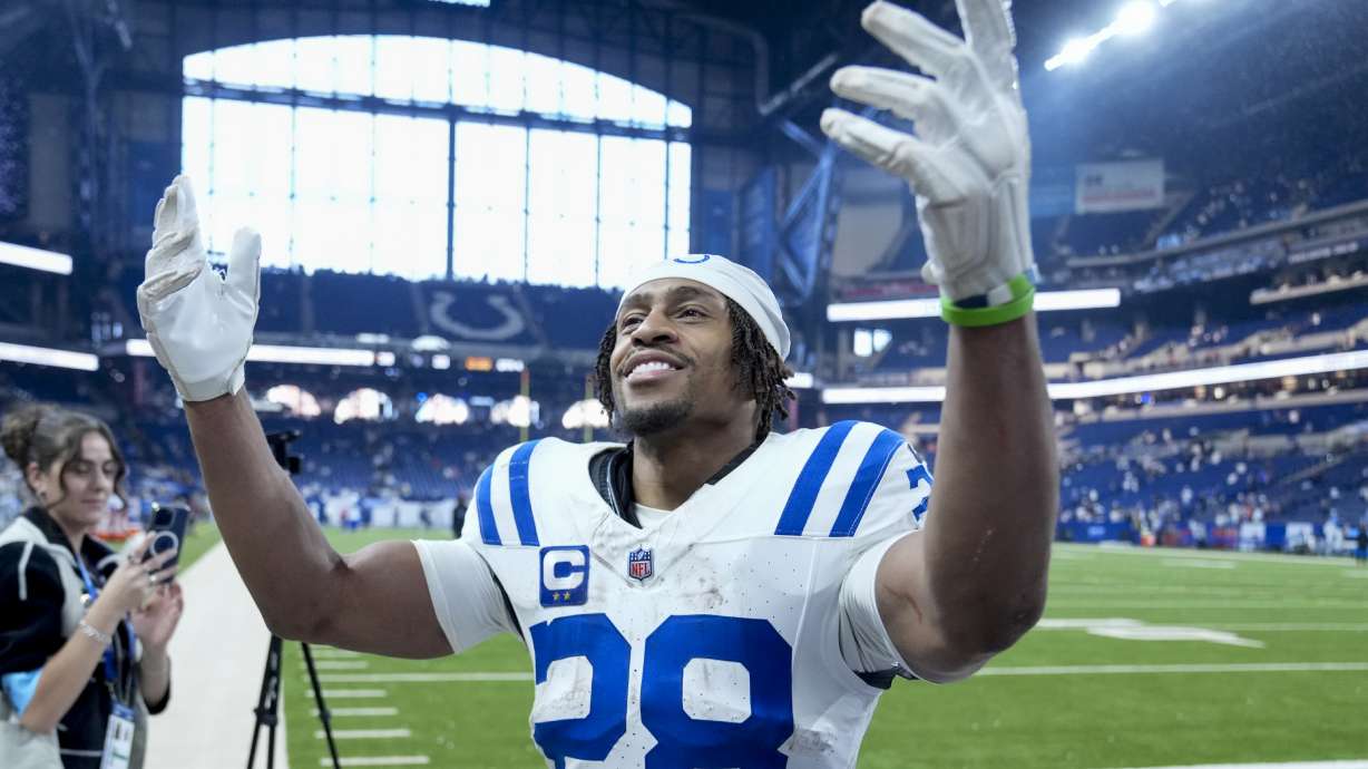 Indianapolis Colts running back Jonathan Taylor (28) celebrates the team's win against the Tennessee Titans after an NFL football game Sunday, Dec. 22, 2024, in Indianapolis.