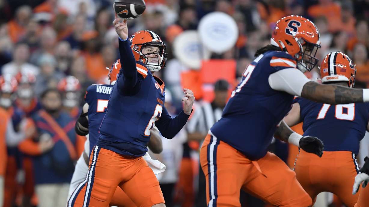 Syracuse quarterback Kyle McCord (6) throws during the first half of an NCAA college football game against Miami on Saturday, Nov. 30, 2024 in Syracuse, N.Y.