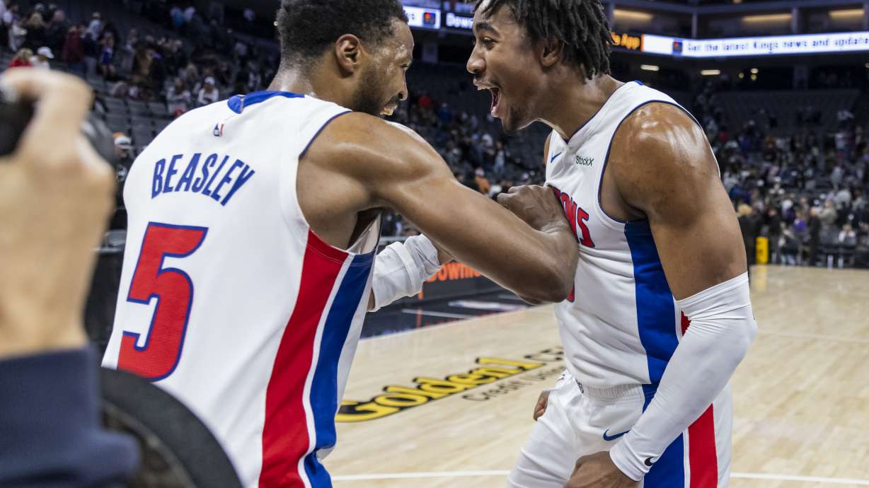 Detroit Pistons guard Malik Beasley, left, celebrates after guard Jaden Ivey, right, makes the game winning shot of an NBA basketball game against the Sacramento Kings, Thursday, Dec. 26, 2024, in Sacramento, Calif.