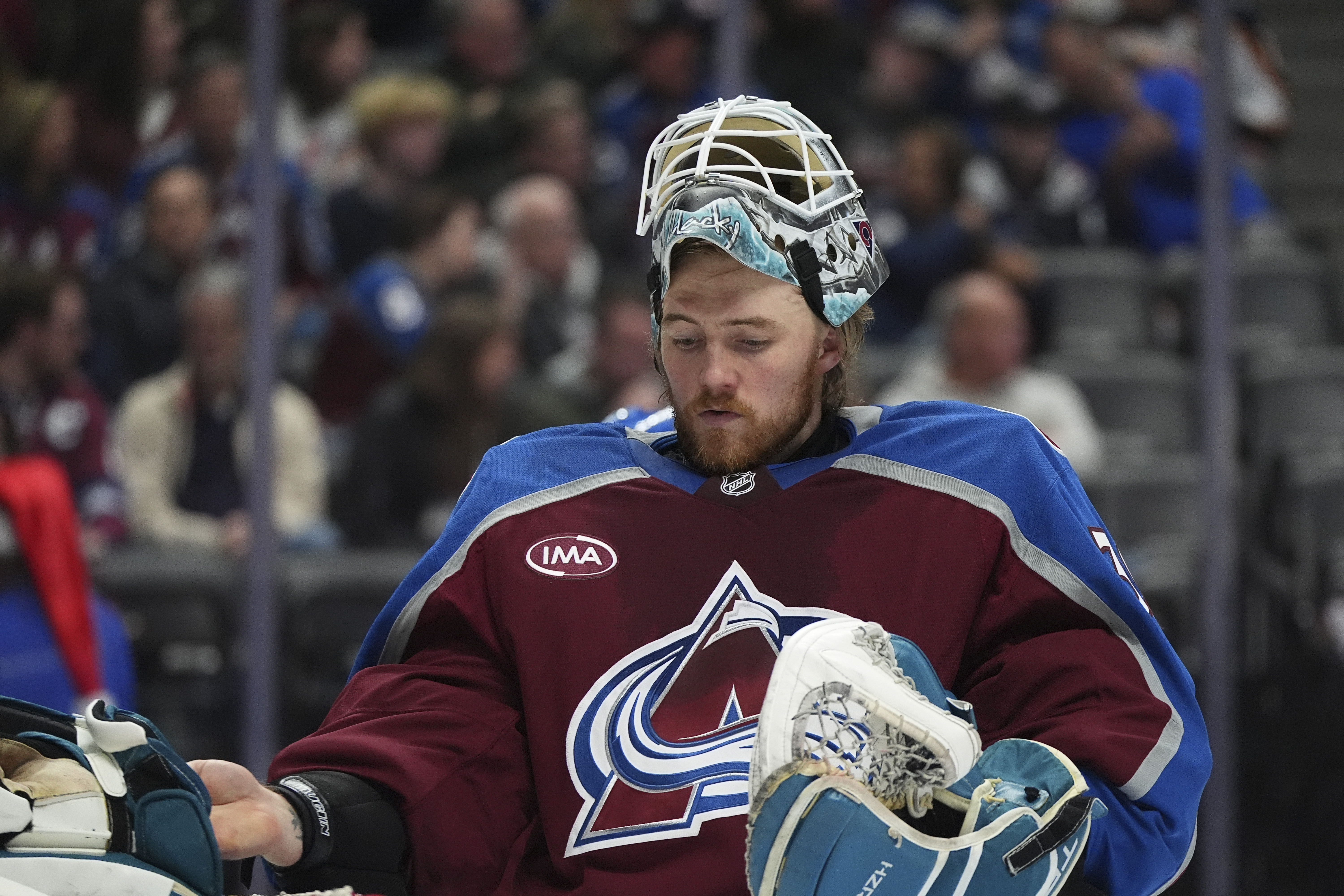 Colorado Avalanche goaltender Mackenzie Blackwood prepares for the second period of an NHL hockey game against the Seattle Kraken, Sunday, Dec. 22, 2024, in Denver.