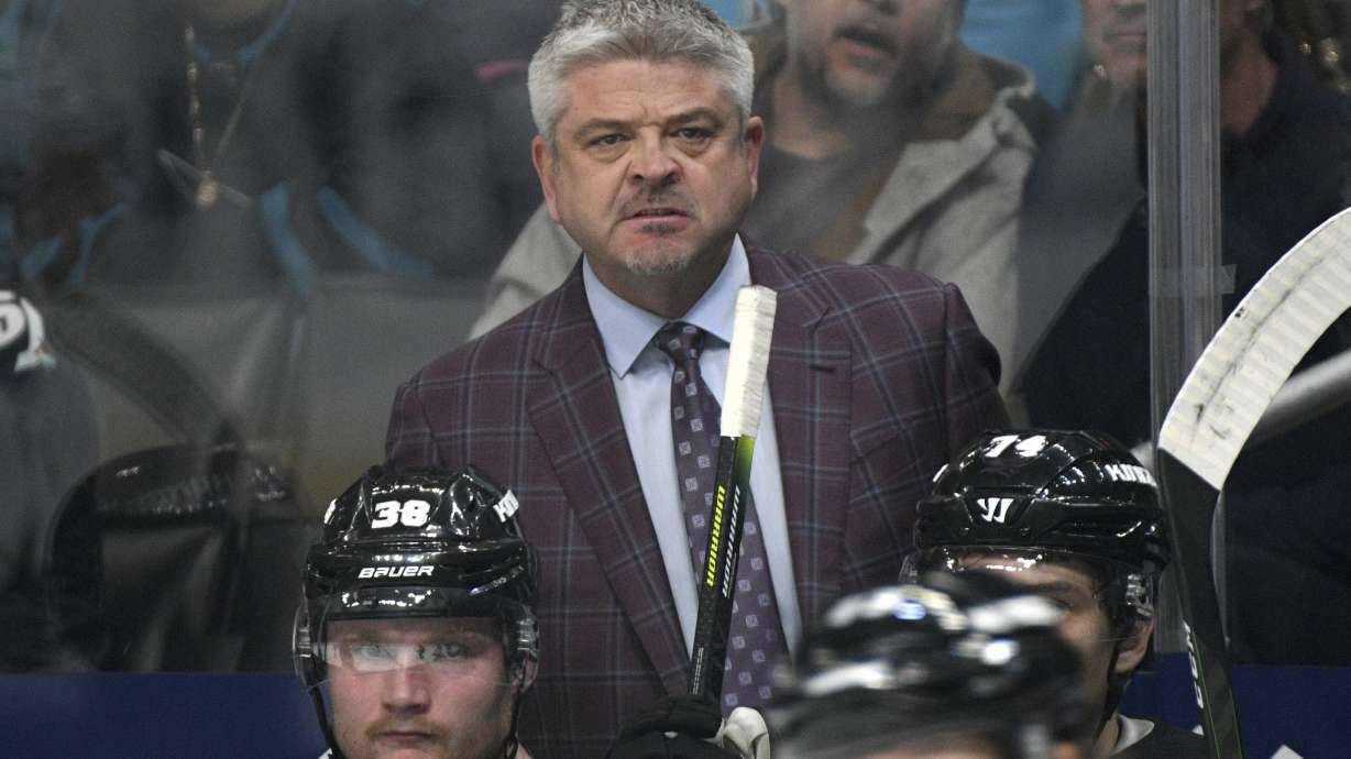 FILE - Los Angeles Kings head coach Todd McLellan watches his team's NHL hockey game against the San Jose Sharks in Los Angeles, Nov. 25, 2019.