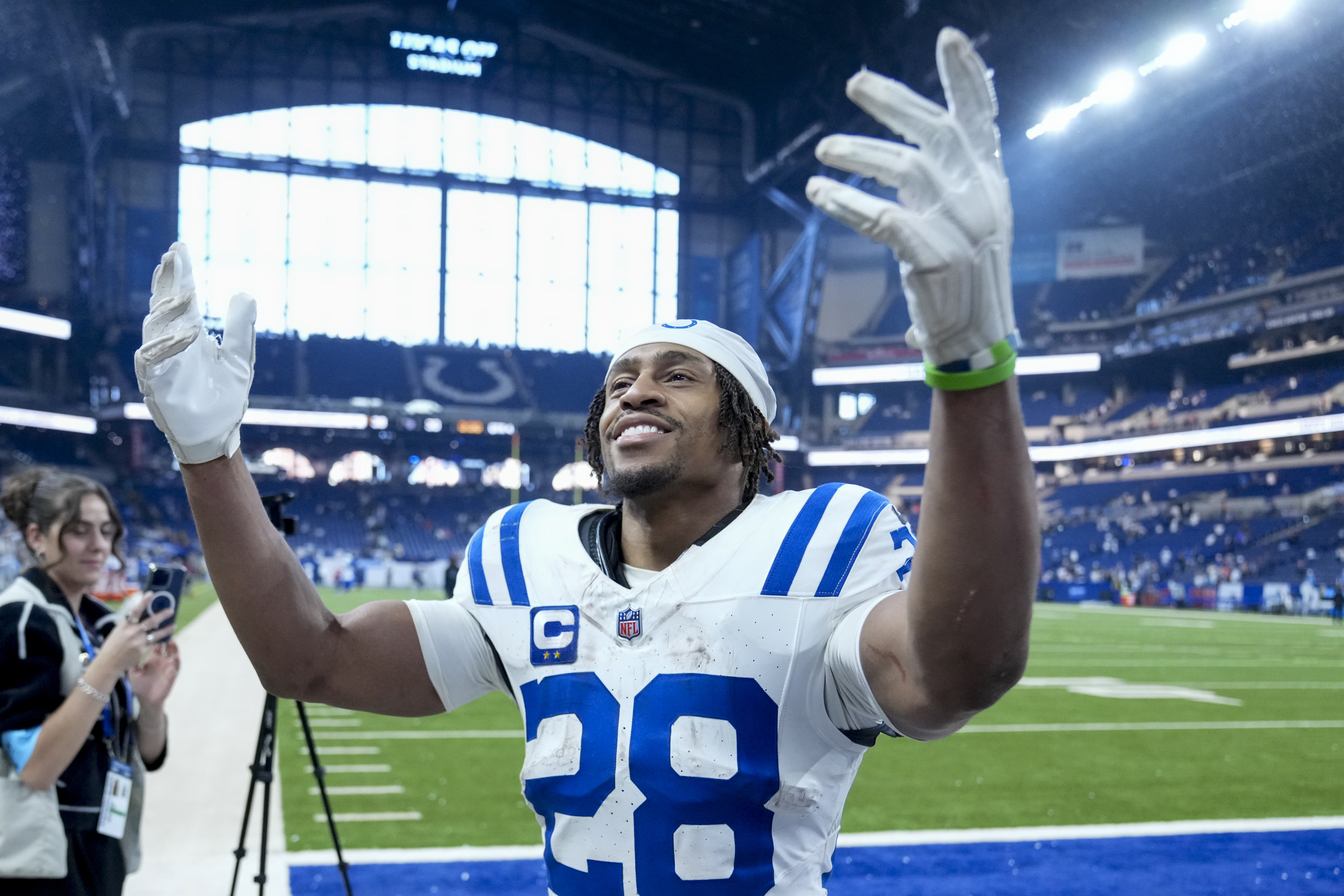 Indianapolis Colts running back Jonathan Taylor (28) celebrates the team's win against the Tennessee Titans after an NFL football game Sunday, Dec. 22, 2024, in Indianapolis. 