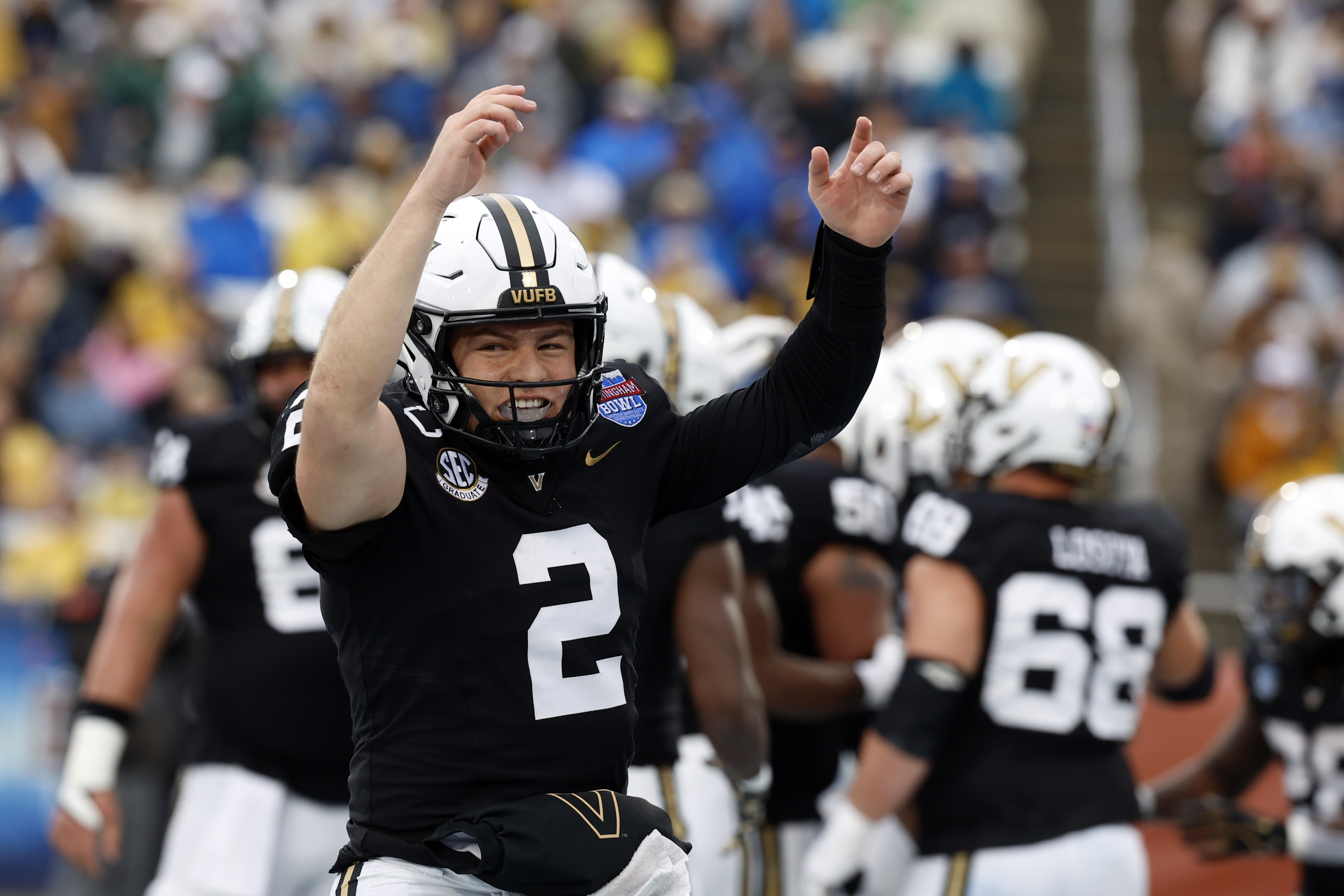 Vanderbilt quarterback Diego Pavia (2) celebrates after throwing a touchdown pass against Georgia Tech during the first half of the Birmingham Bowl NCAA college football game, Friday, Dec. 27, 2024, in Birmingham, Ala. 