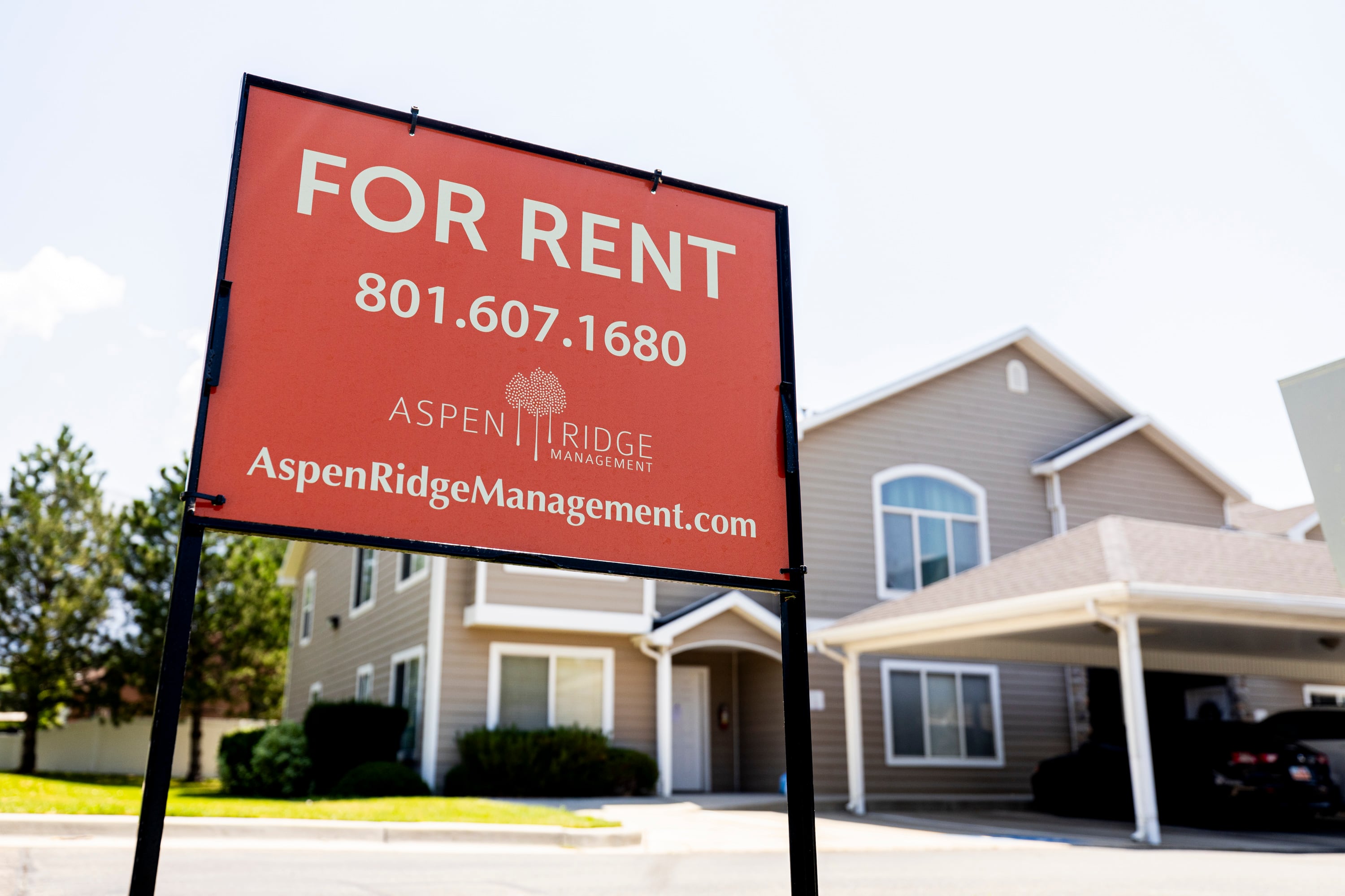 A “For Rent” sign is displayed outside apartments in Orem on July 17.