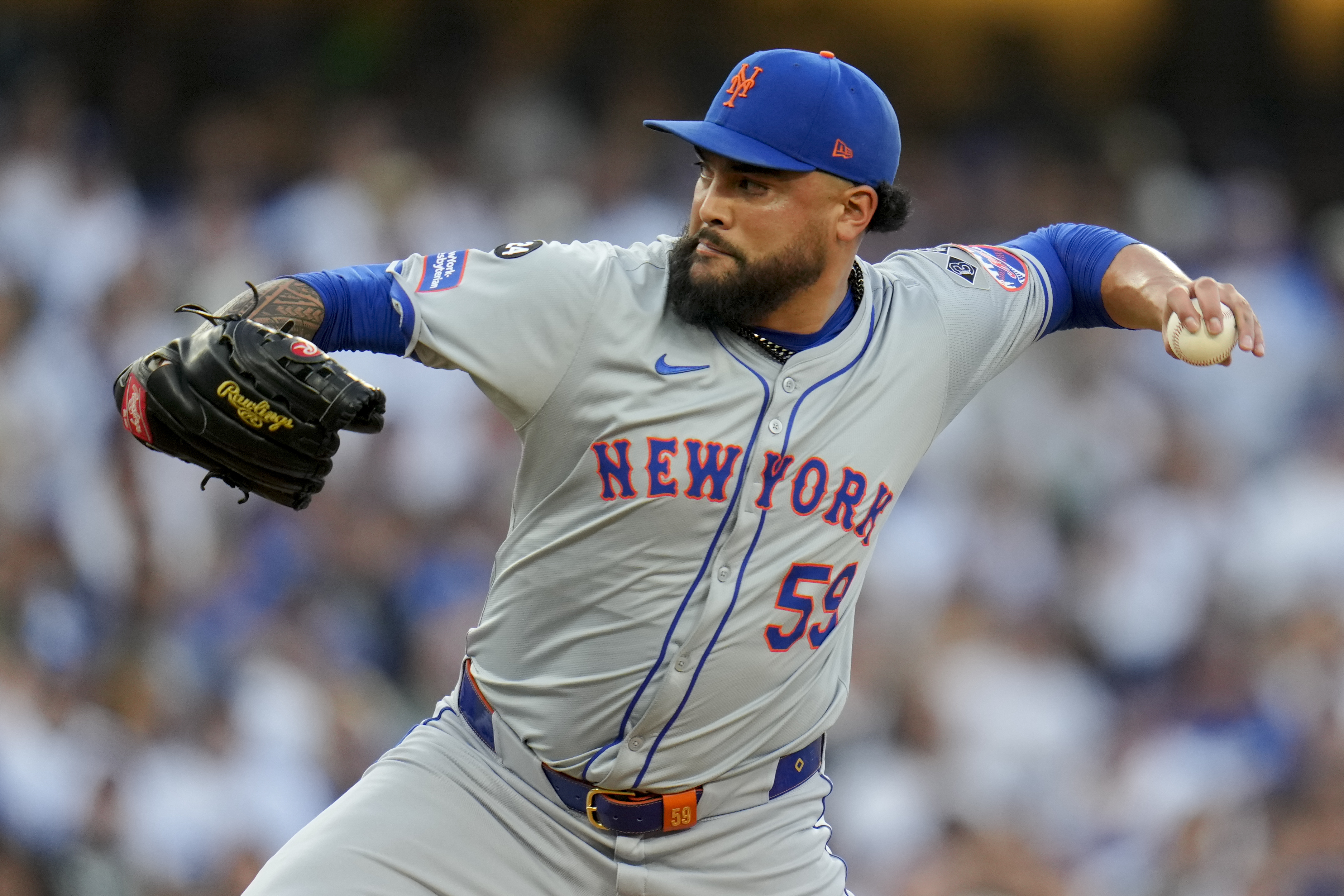 FILE - New York Mets pitcher Sean Manaea throws against the Los Angeles Dodgers during the first inning in Game 6 of a baseball NL Championship Series, Sunday, Oct. 20, 2024, in Los Angeles.