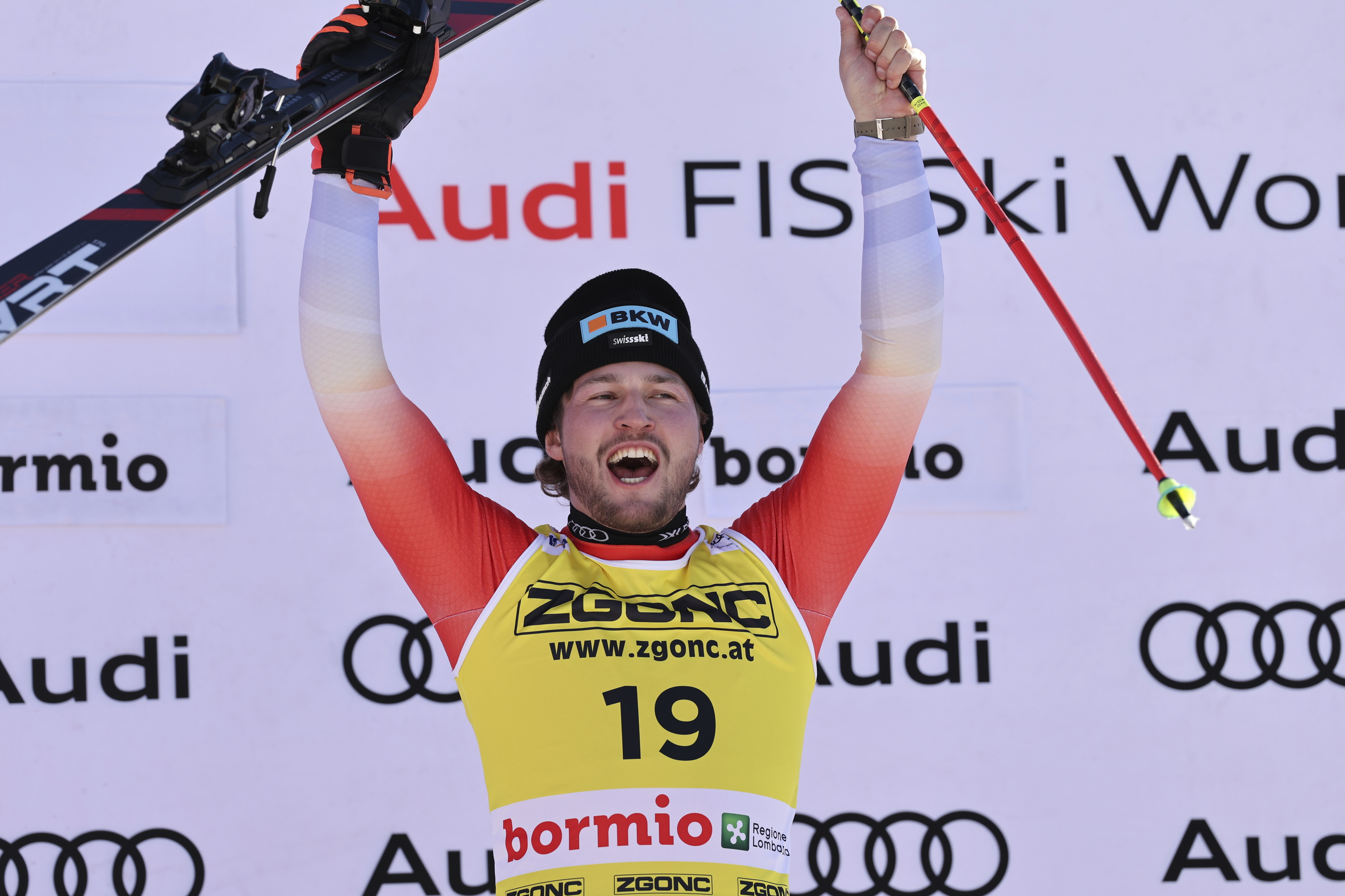 Switzerland's Alexis Monney celebrates after winning an alpine ski, men's World Cup downhill race, in Bormio, Italy, Saturday, Dec. 28, 2024. 