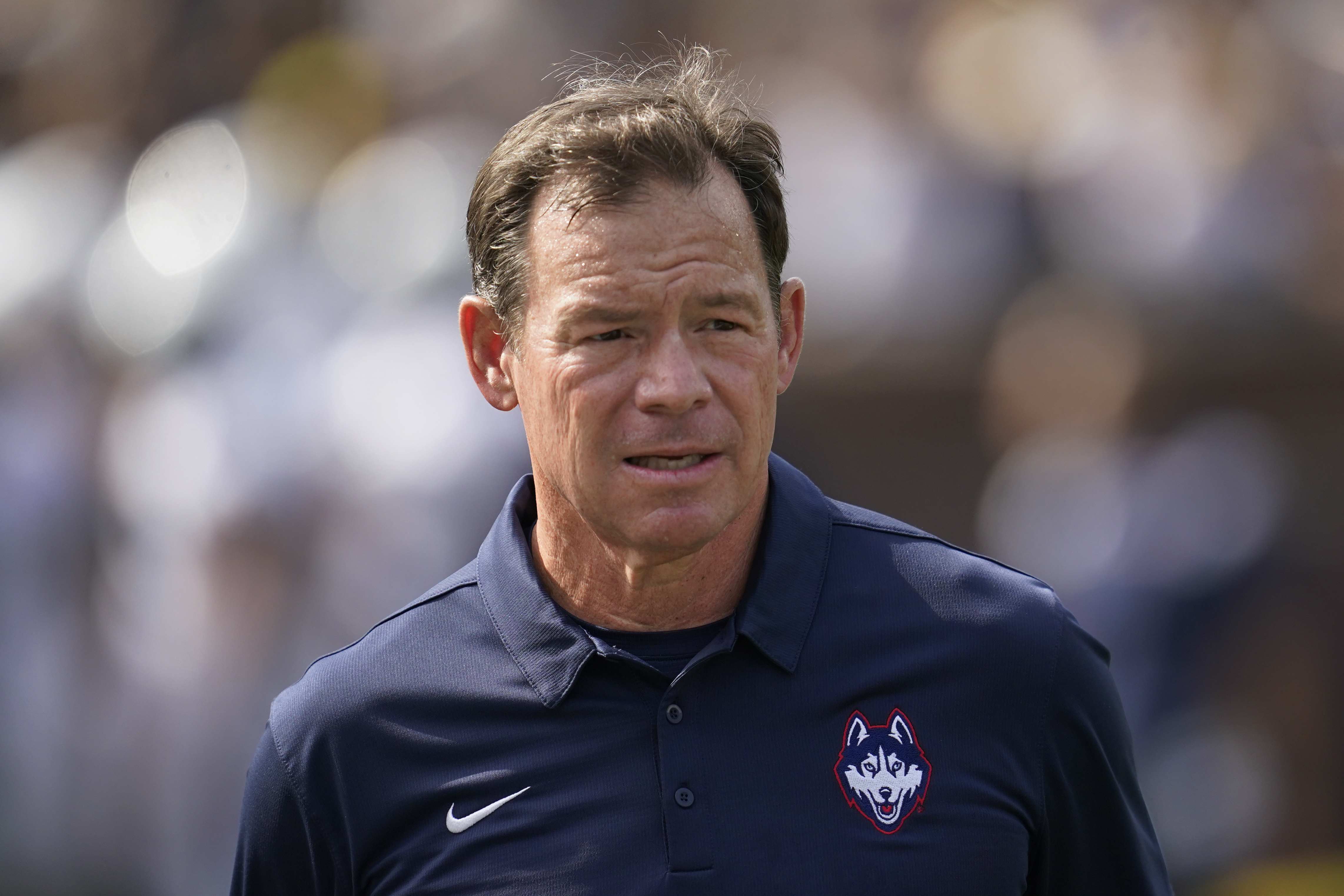 UConn signs coach Jim Mora to contract extension through 2028