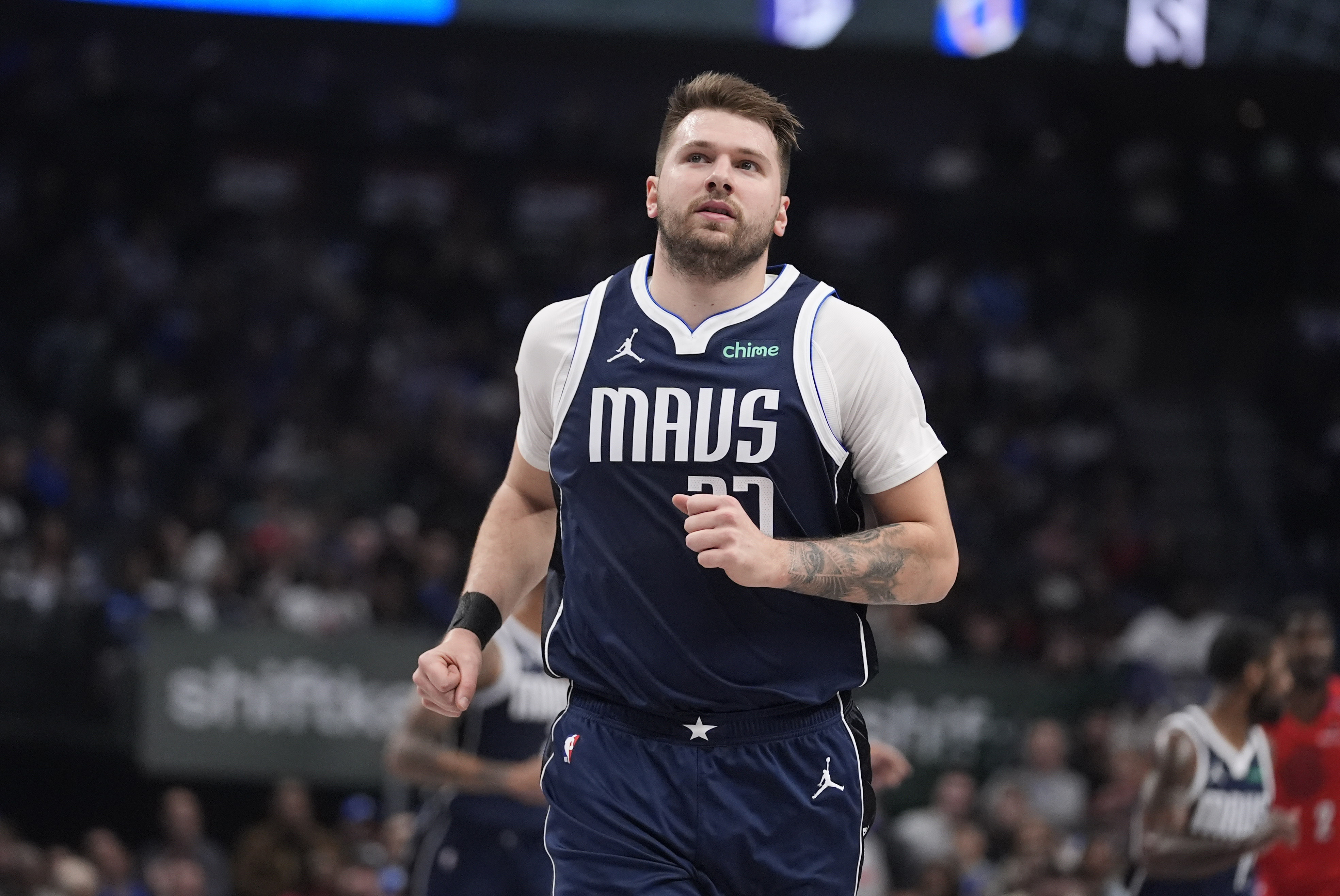 Dallas Mavericks guard Luka Doncic runs during the first half of an NBA basketball game against the Portland Trail Blazers, Monday, Dec. 23, 2024, in Dallas.