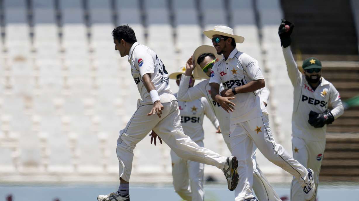 Pakistan's Mohammad Abbas, left, celebrates with his teammates after dismissing South Africa's David Bedingham for 14 runs during day four of the Test cricket match between South Africa and Pakistan, at the Centurion Park in Centurion, South Africa, Sunday, Dec. 29, 2024.