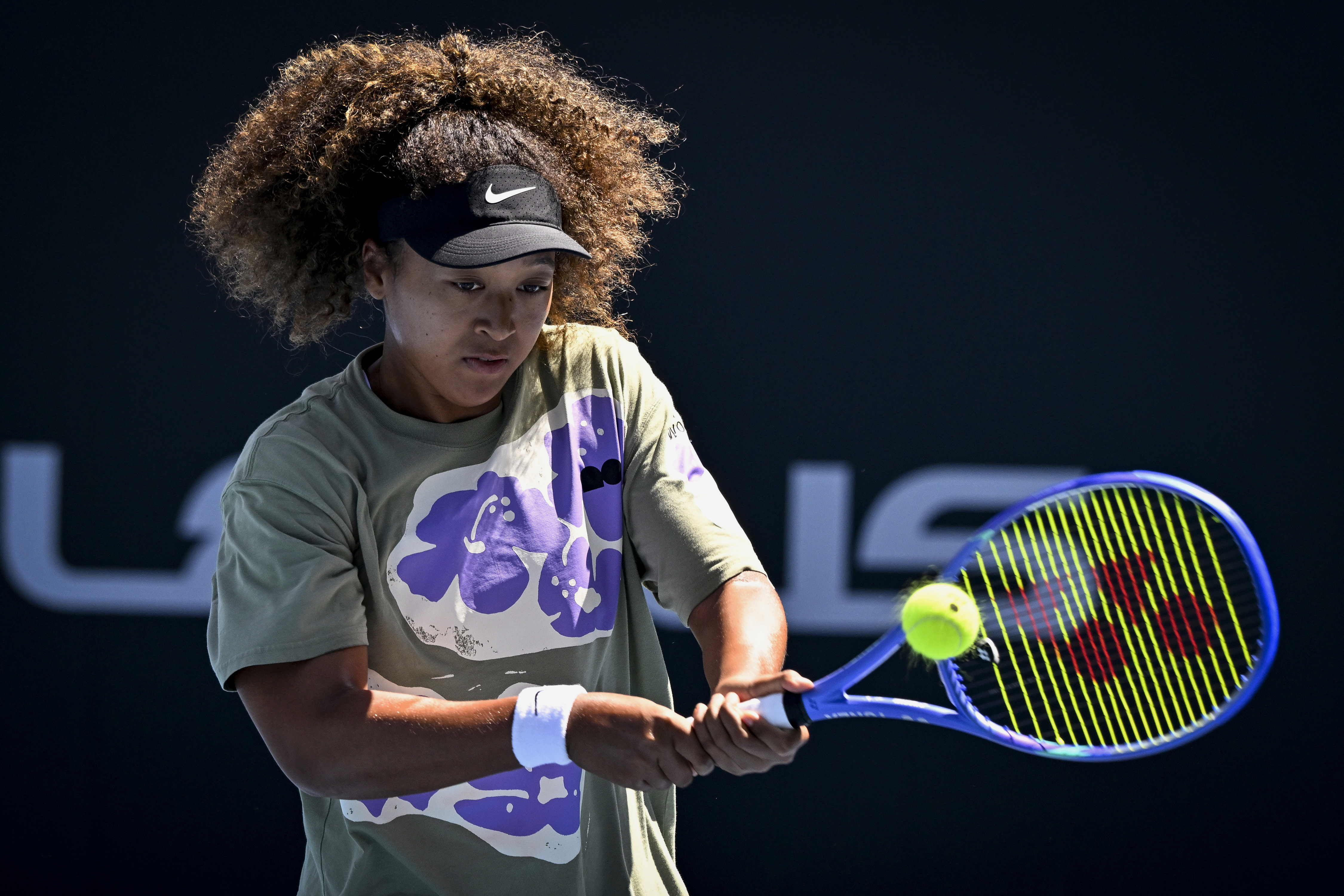 Naomi Osaka of Japan returns a shot during a practice session at Manuka Doctor Arena in Auckland, New Zealand, Sunday, Dec. 29, 2024, ahead of the ASB Classic tennis tournament.