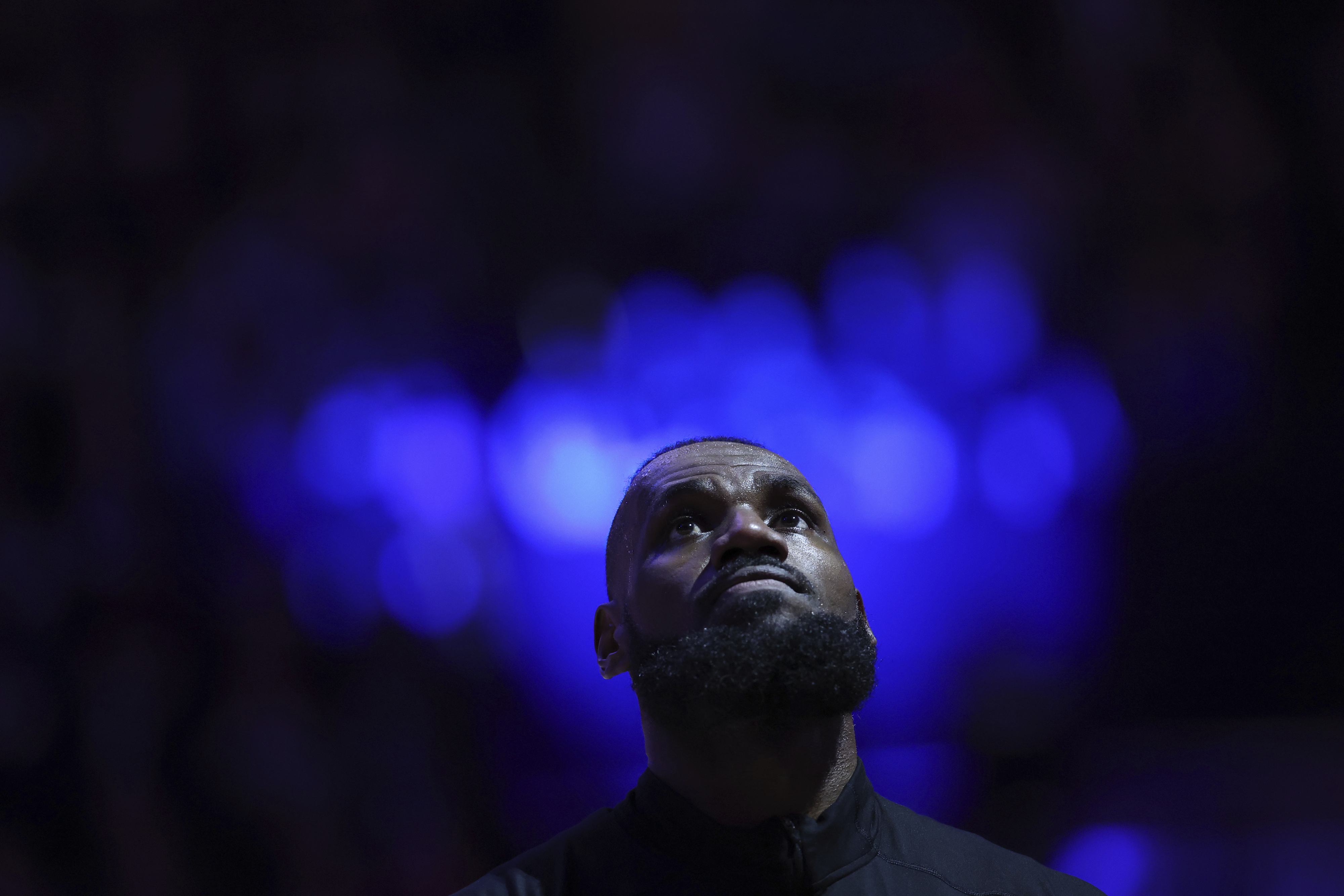 Los Angeles Lakers forward LeBron James warms up prior to an NBA basketball game against the Sacramento Kings in Sacramento, Calif., Thursday, Dec. 19, 2024.
