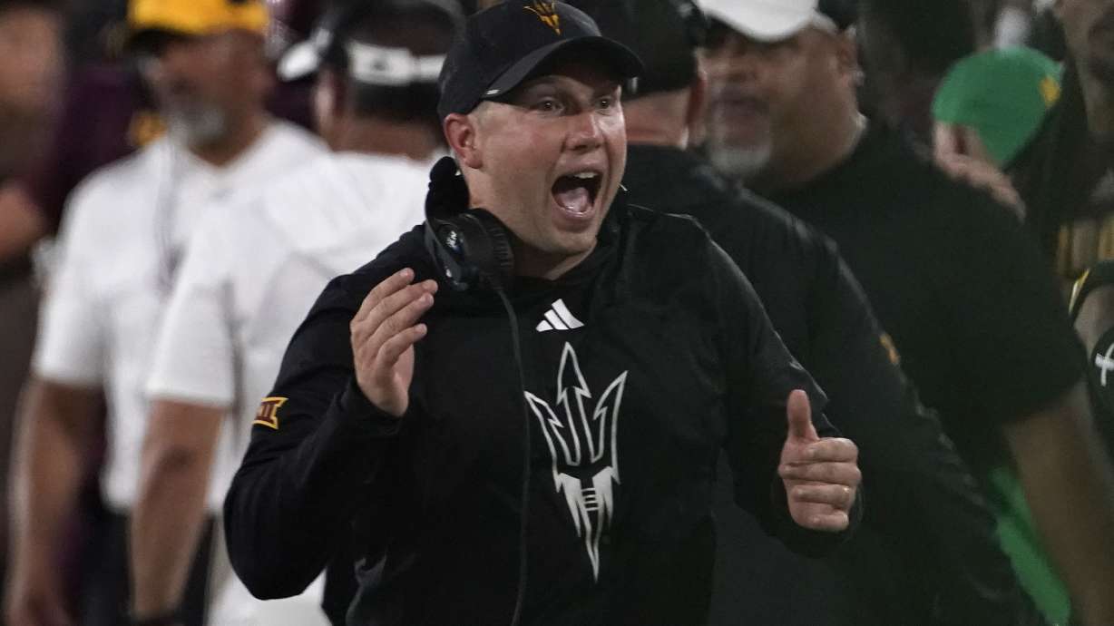 FILE - Arizona State head coach Kenny Dillingham celebrates a touchdown against Kansas during the second half of an NCAA college football game Saturday, Oct. 5, 2024, in Tempe, Ariz.