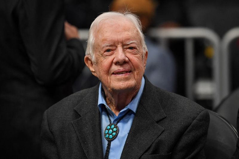 Former USA president Jimmy Carter shown at the game between the Atlanta Hawks and the New York Knicks at State Farm Arena, Feb 14, 2019, in Atlanta, Georgia.