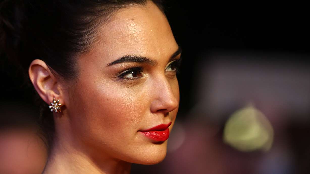 Gal Gadot is opening up about how she survived a "massive blood clot" in her brain during her most recent pregnancy.