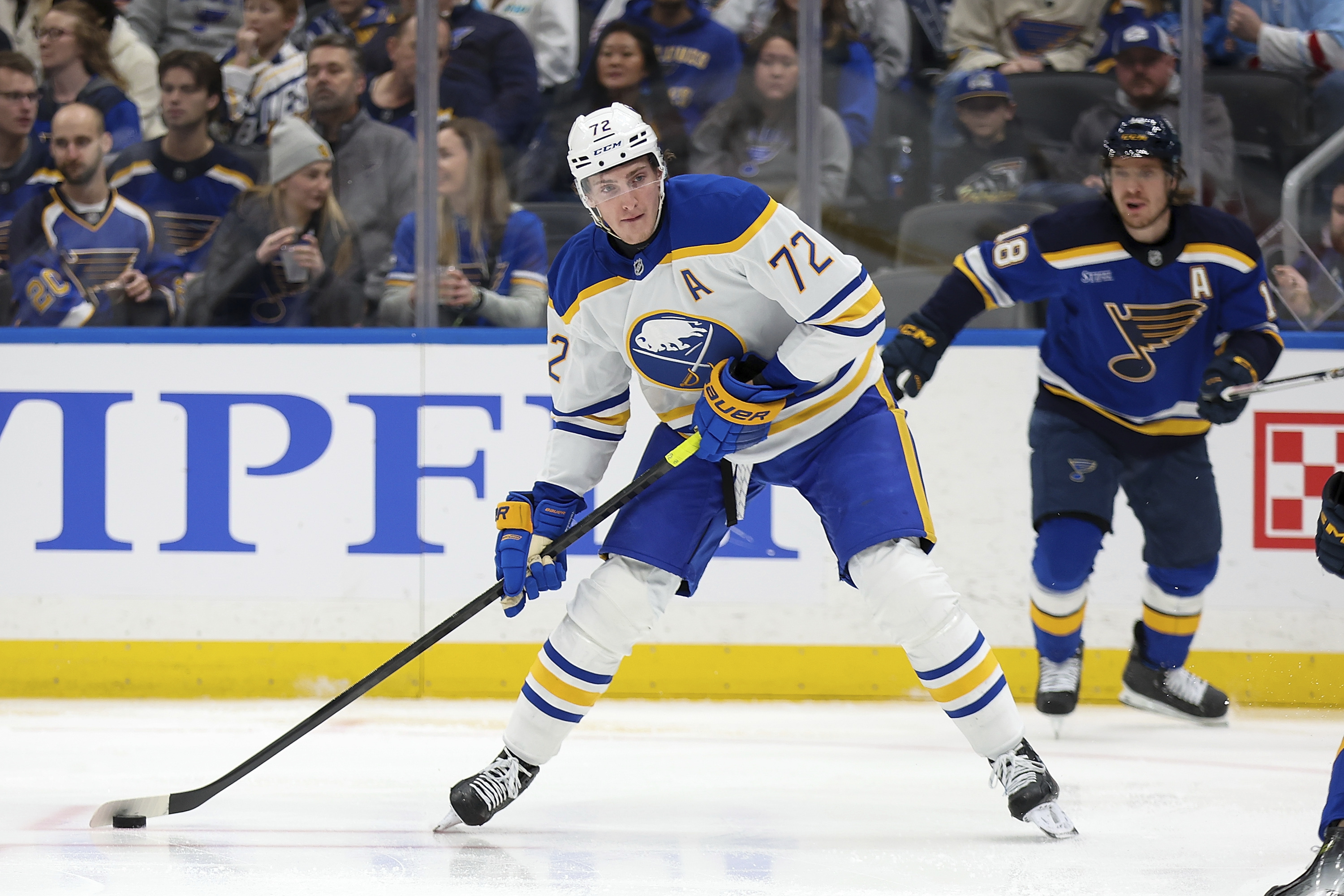 Buffalo Sabres' Tage Thompson (72) looks to pass the puck during the first period of an NHL hockey game against the St. Louis Blues, Sunday, Dec. 29, 2024, in St. Louis.