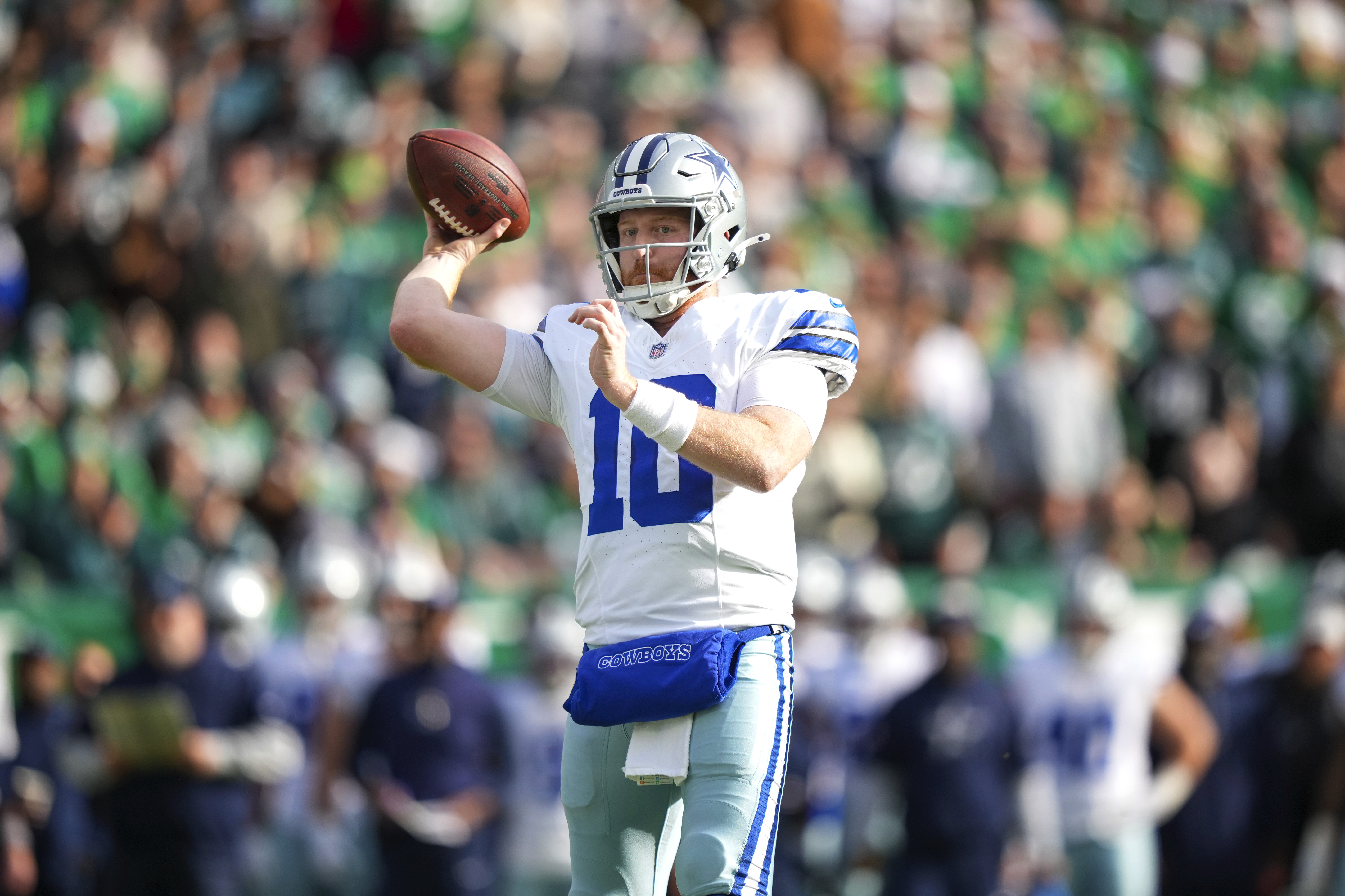 Dallas Cowboys quarterback Cooper Rush throws a pass against the Philadelphia Eagles during the first half of an NFL football game, Sunday, Dec. 29, 2024, in Philadelphia.