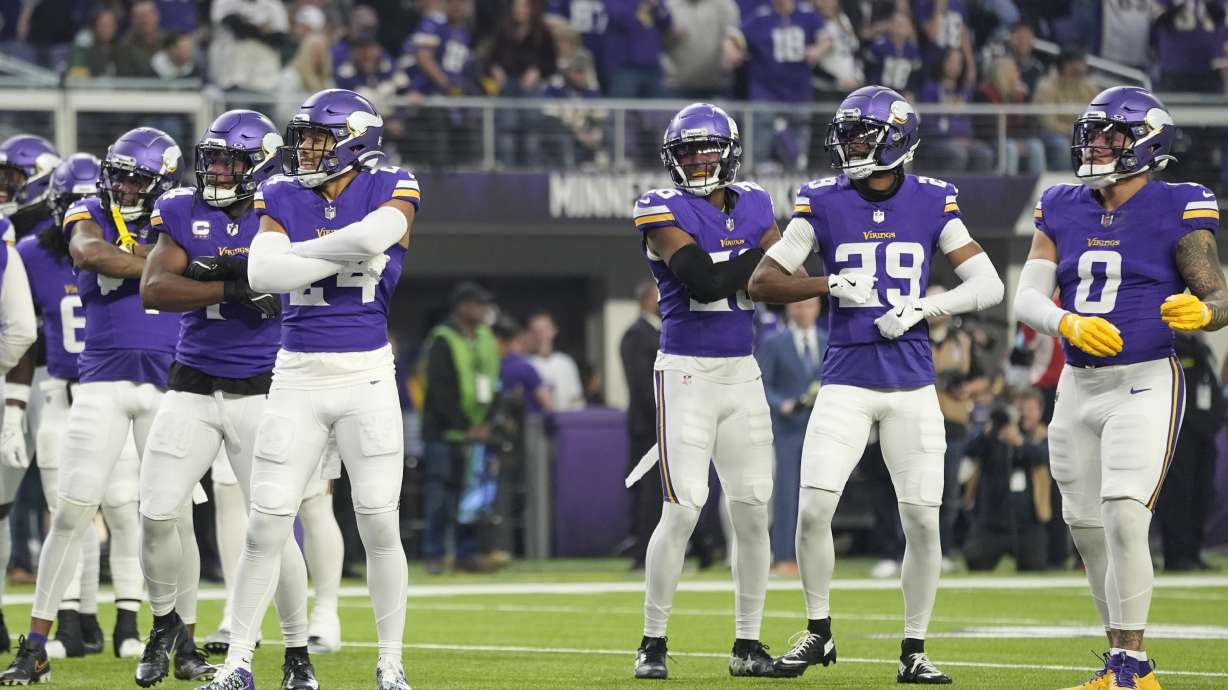 Minnesota Vikings safety Camryn Bynum and teammates break into a "High School Musical"-themed celebration after his fumble recovery during the first half of an NFL football game against the Green Bay Packers Sunday.