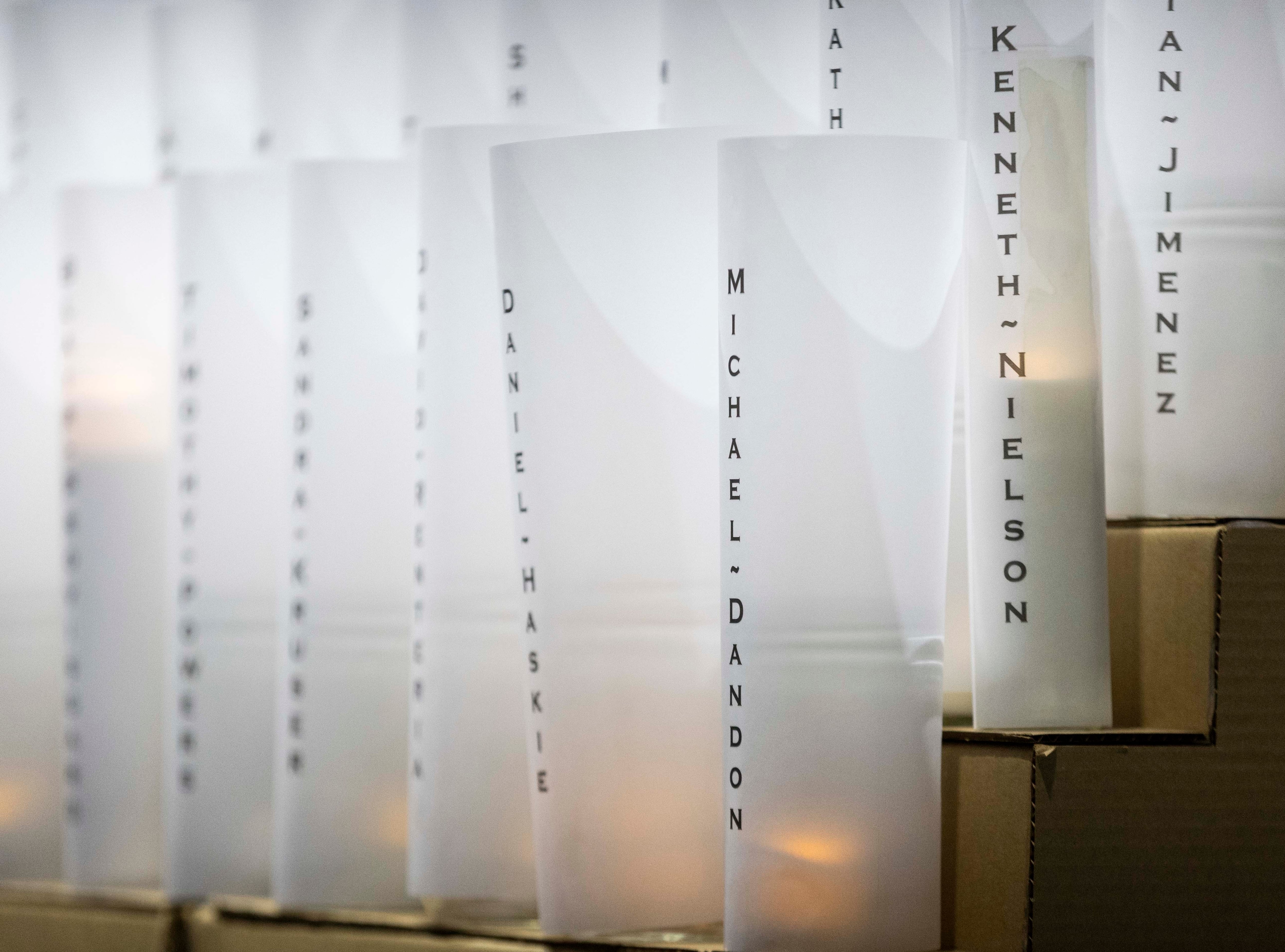 Candles adorned with the names of those who have died are honored at the center of the annual Homeless Persons’ Memorial Vigil, hosted by the Salt Lake Valley Coalition to End Homelessness, in Pioneer Park in Salt Lake City on Dec. 19.