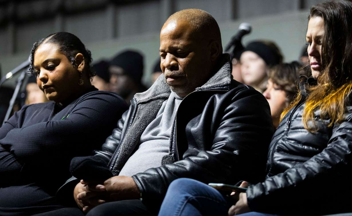Pastor Shawn Clay, center, bows his head and closes his eyes during a moment of silence to remember those who have died during the annual Homeless Persons’ Memorial Vigil, hosted by the Salt Lake Valley Coalition to End Homelessness, in Pioneer Park in Salt Lake City on Dec. 19.